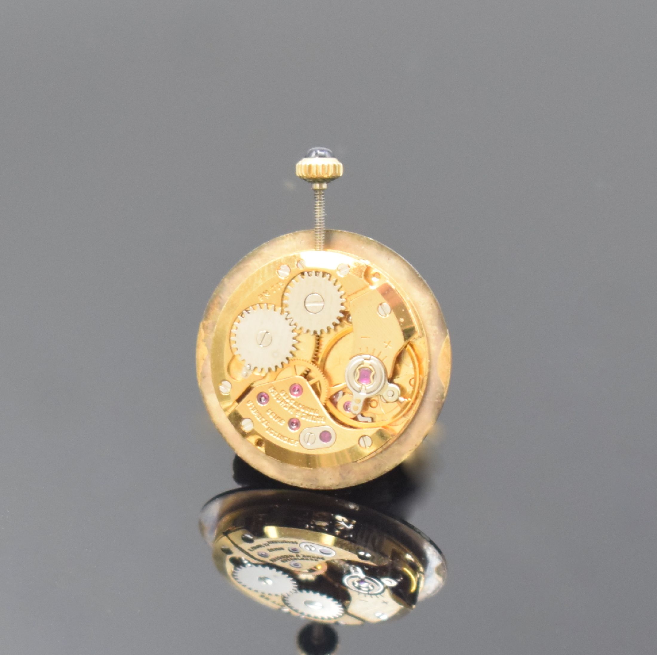 Detail e: BAUME & MERCIER Damenarmbanduhr in GG 750/000, Schweiz um 1975, Handaufzug, Boden aufgedr., orig. Lederband m. verg. Dornschl., Schmuckkrone, ...