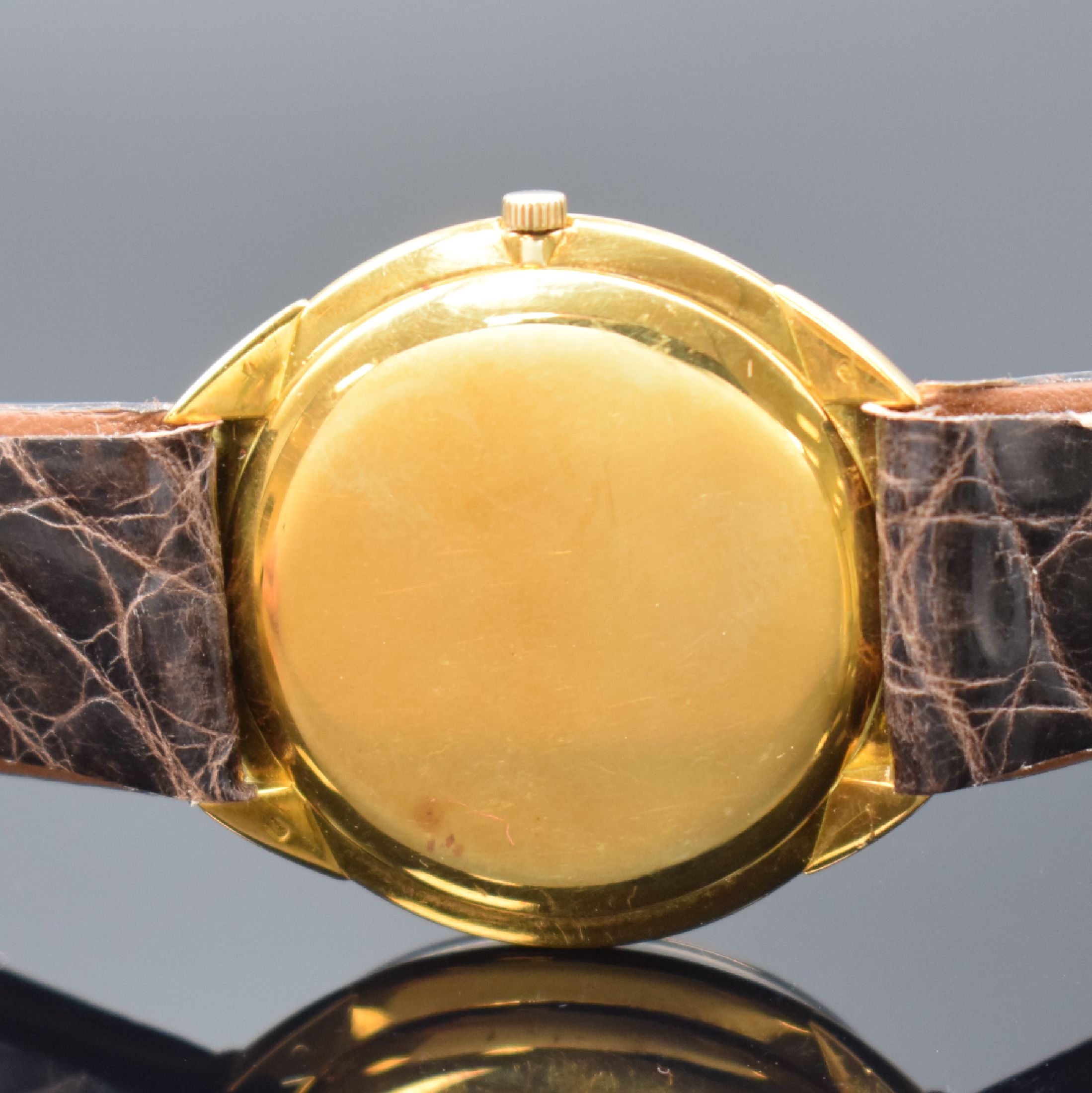 Detail c: CORUM Armbanduhr in GG 750/000, Schweiz um 1960, Handaufzug, 3-tlg. Geh., Boden u. Glasrand aufgedr., silb. Zifferbl. rest., gold. Indizes u. Zeiger, ...