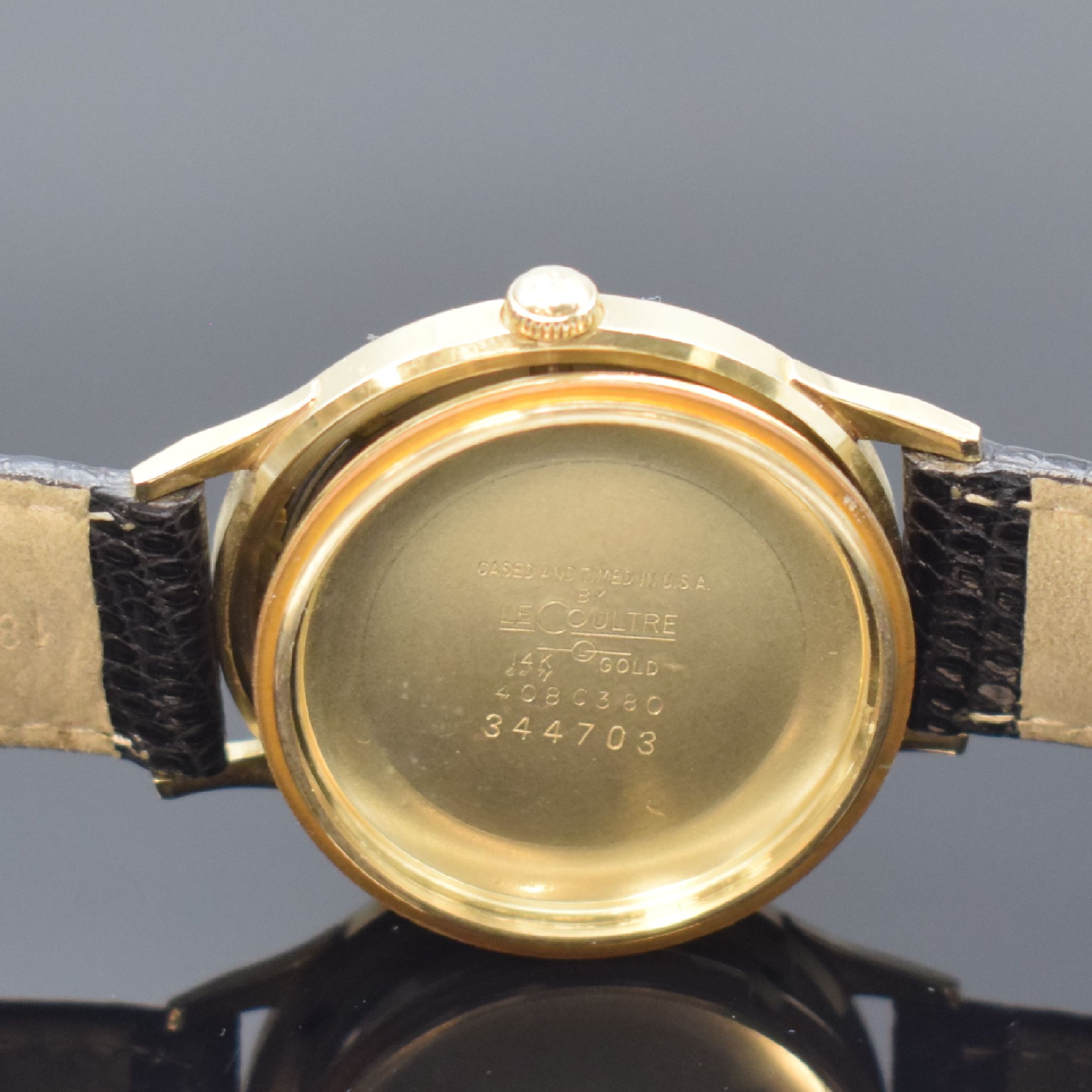 Detail e: LeCoultre Herrenarmbanduhr in 14k Gold filled, Schweiz um 1950, Hammerautomatik, Boden verschr., silb. orig. Zifferbl. fl., gold. Std.-Ind., gold. ...