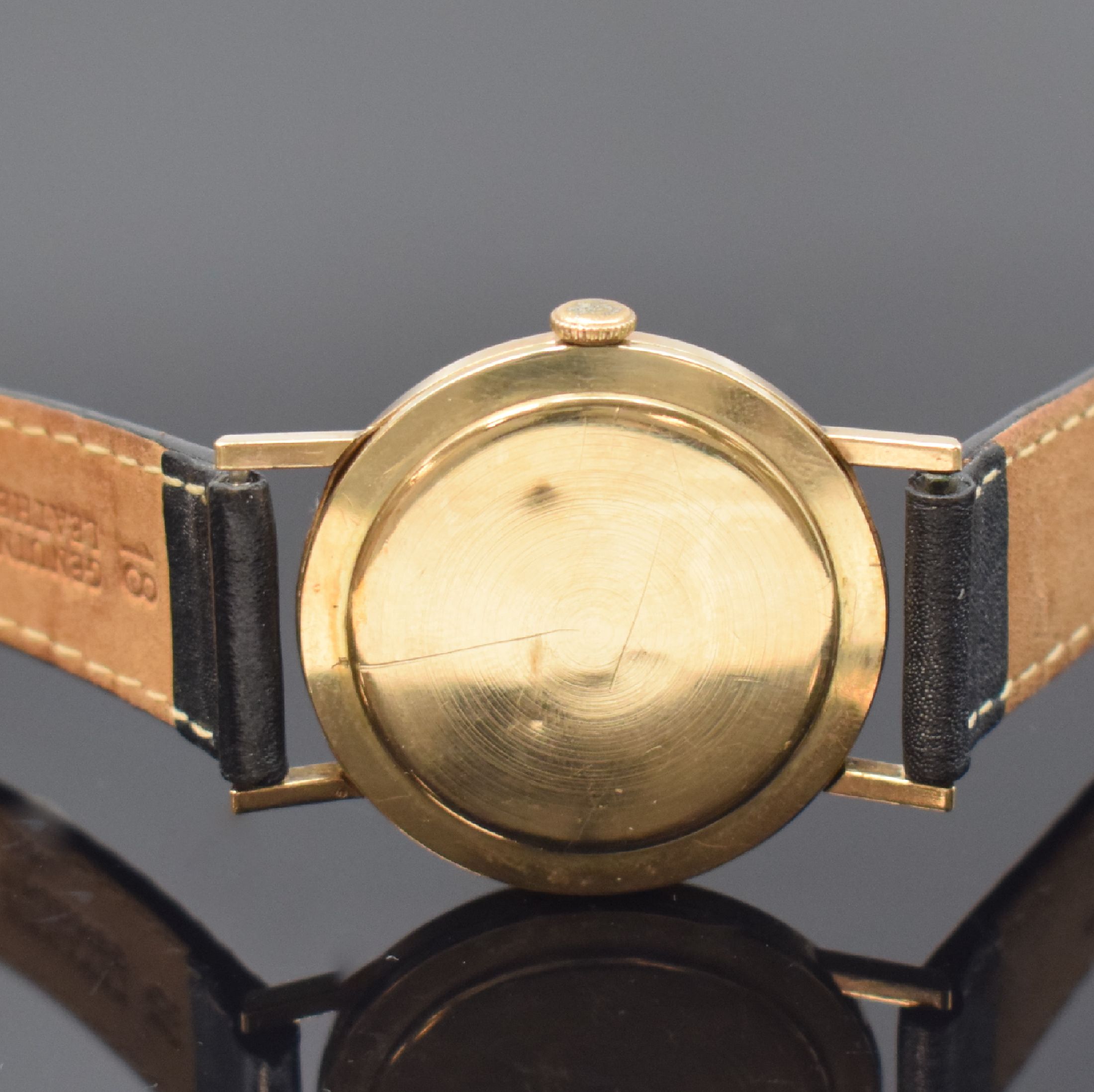 Detail c: TUDOR Herrenarmbanduhr in GG 375/000, Schweiz f. den engl. Markt um 1960, Handaufzug, neutr. Geh., Boden aufgedr. (dell.), silb. Zifferbl. m. gold. ...