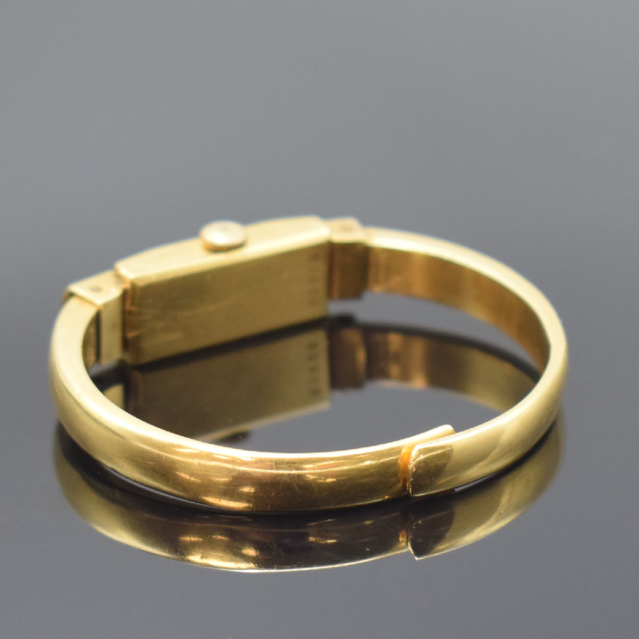 Detail c: BAUME & MERCIER Spangenuhr in GG 750/000, Schweiz um 1940, Handaufzug, Boden aufgedr., silb. Zifferbl. altersbed. pat./fl., gold. Std.-Ind. u. ...