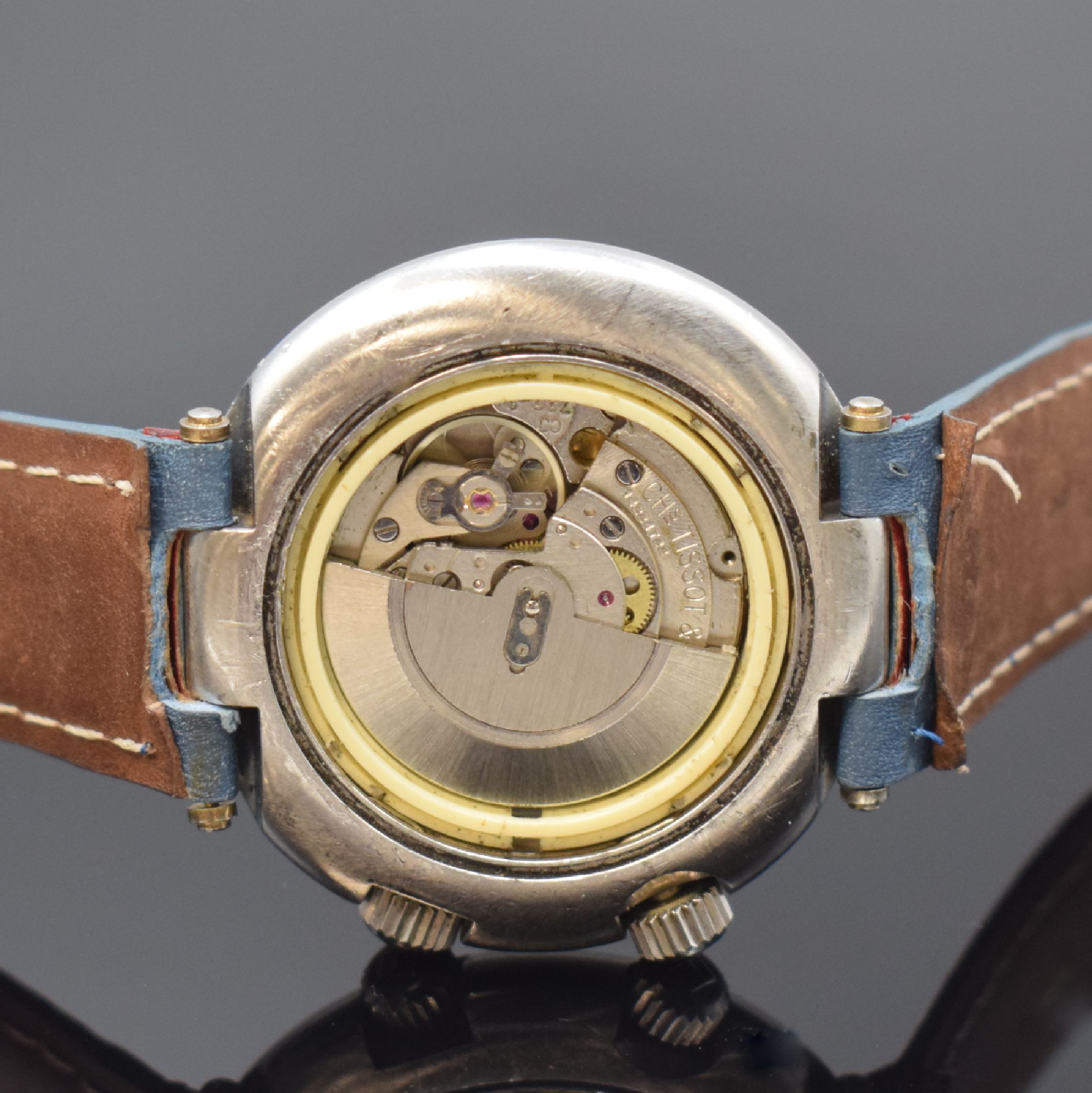Detail e: TISSOT Sideral Herrenarmbanduhr in Stahl, Schweiz um 1970, Automatik, Boden aufgedr., Stahlband durch neutr. Lederband ers., blaues Zifferbl. m. ...