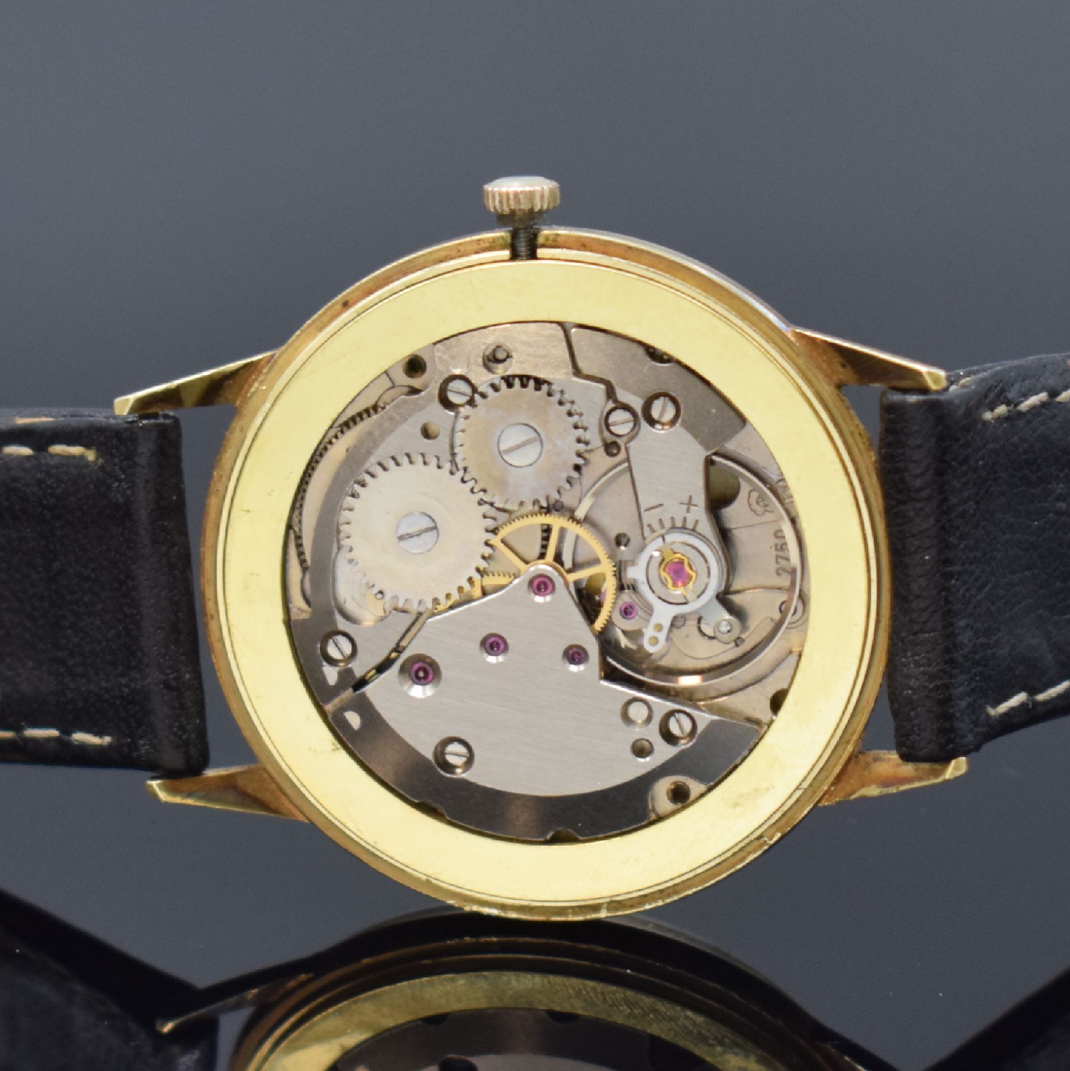 Detail d: BERGANA Herrenarmbanduhr in GG 585/000, Schweiz um 1970, Handaufzug, Boden m. Nutzsp. aufgedr., silb. Zifferbl. m. gold. Std.-Ind., gold. Zeiger, ...