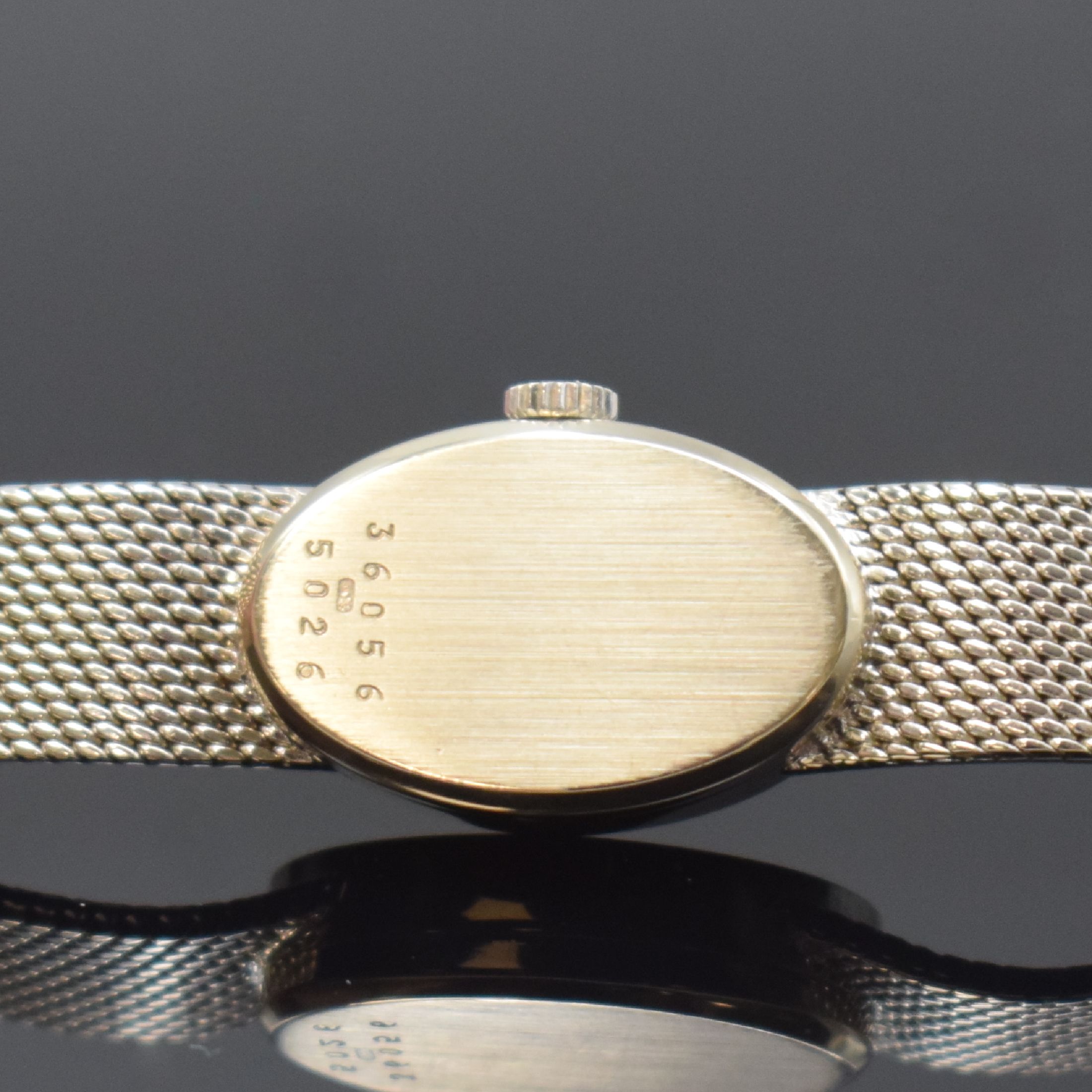 Detail d: CHOPARD Damenarmbanduhr in WG 750/000 Referenz 5026, Schweiz um 1980, Handaufzug, 2-teil. Gehäuse, Boden aufgedr., orig. Milanaiseband, graues ...