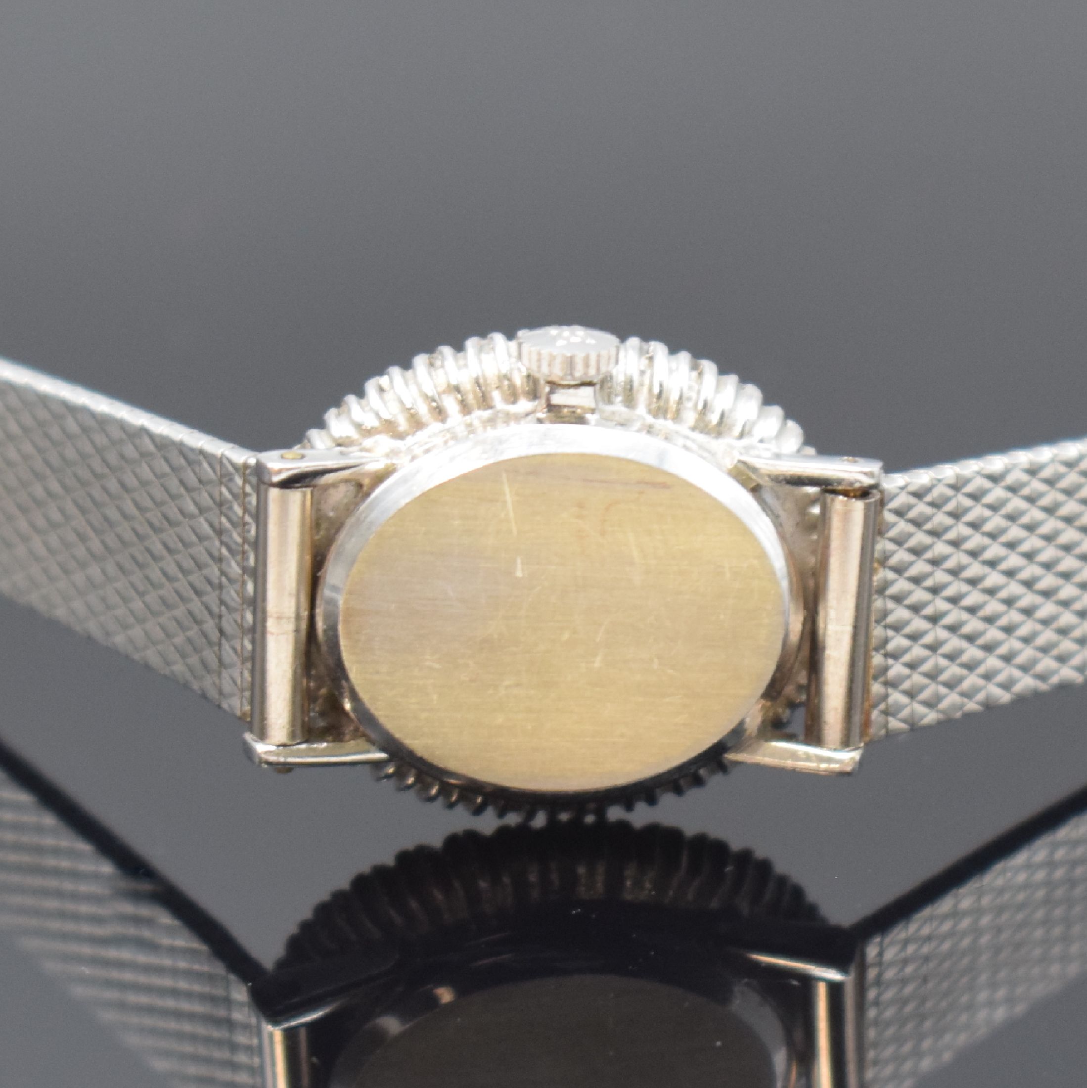 Detail d: EBEL Damenarmbanduhr in WG 750/000 mit Diamanten, Schweiz um 1965, Handaufzug, Boden aufgedr., Lünette aufw. m. Diamanten bes., silb. Zifferbl. m. ...