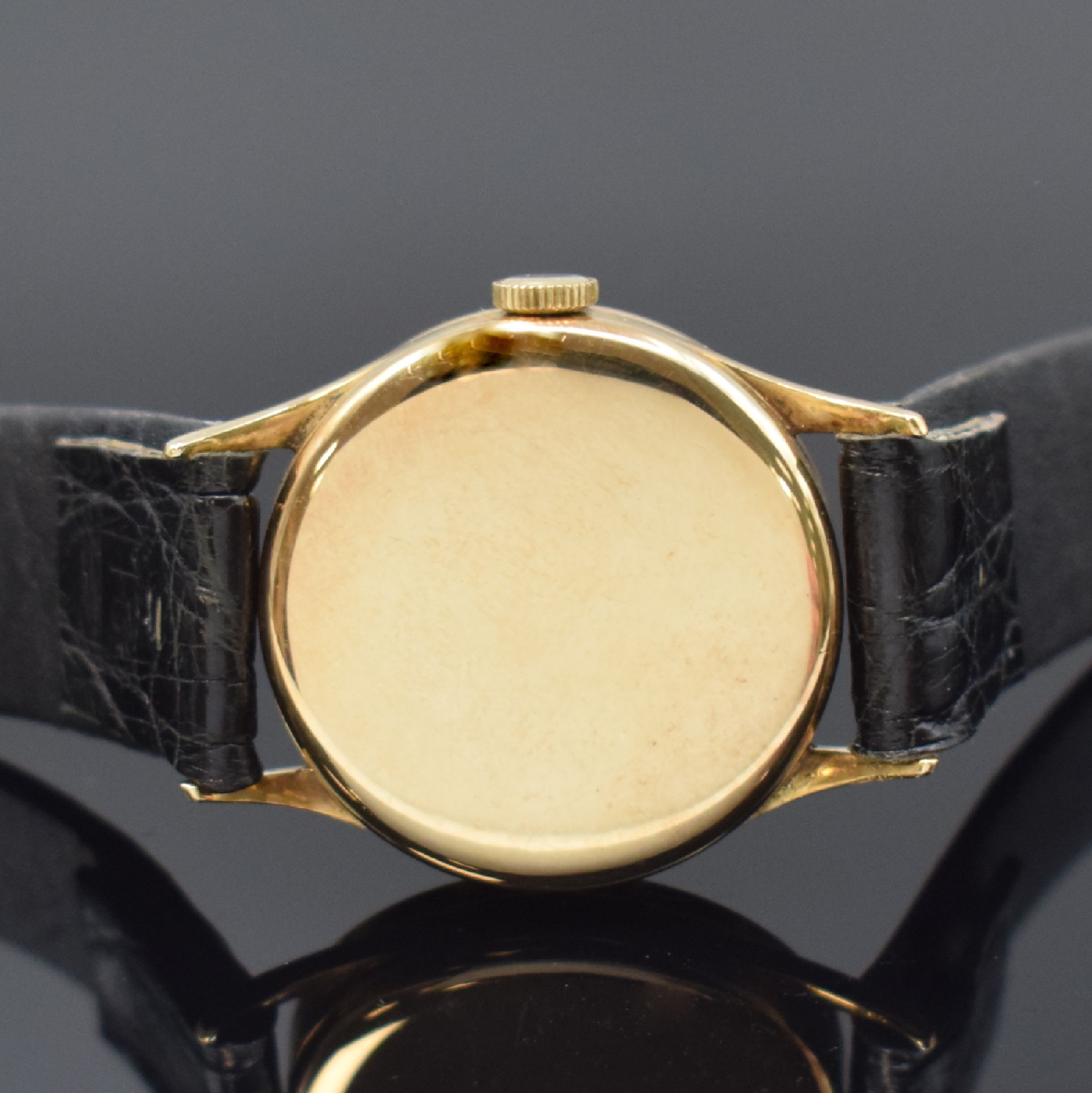 Detail c: IWC Kaliber 83 Armbanduhr in GG 585/000, Schweiz um 1942, Handaufzug, 3-tlg. neutr. Geh., Boden u. Glasrand aufgedr., schwarzes orig. Glanz-Zifferbl. ...