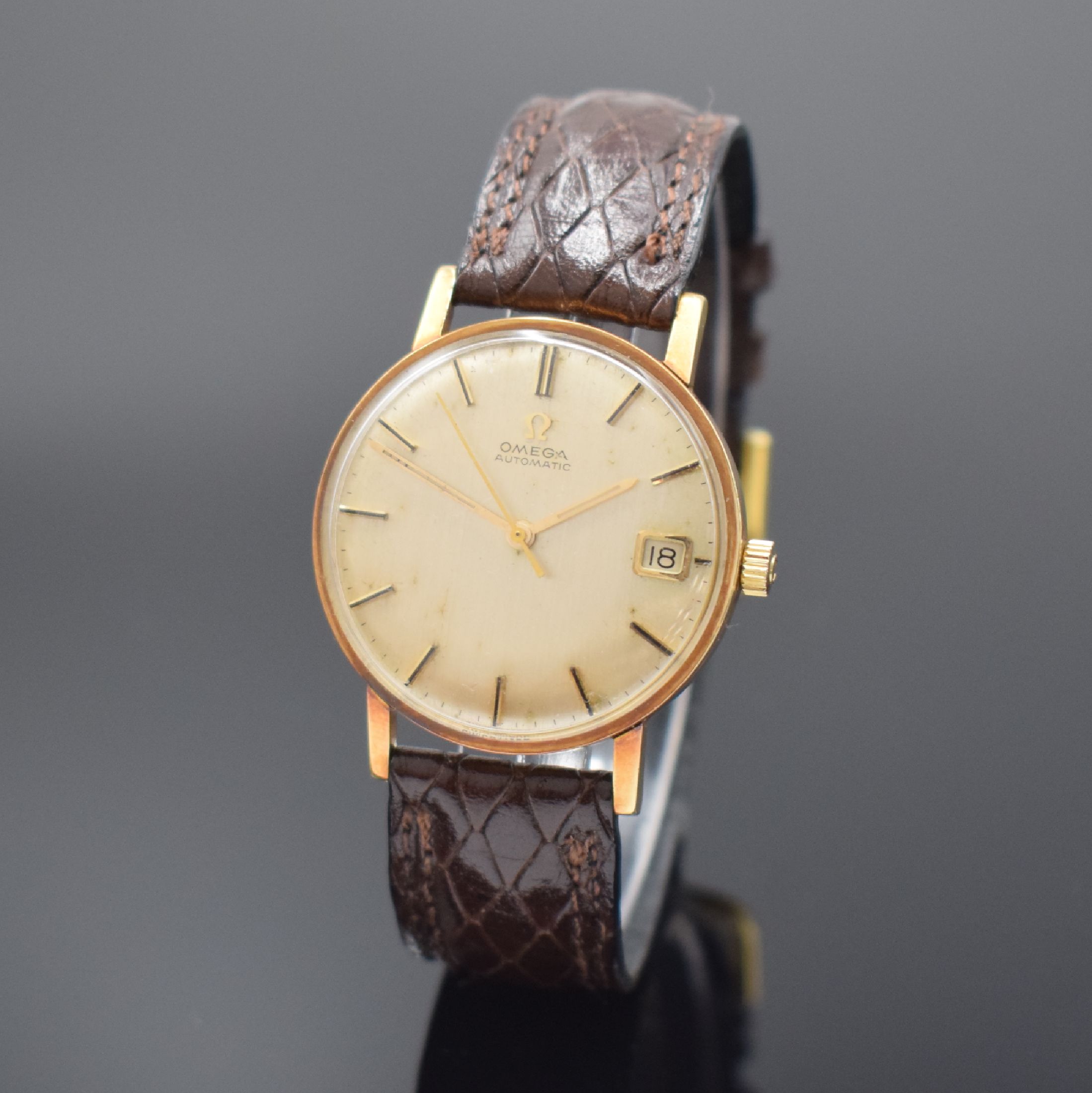 OMEGA Automatik Armbanduhr in GG 585/000 Referenz 14792 62, Schweiz um 1963, 3-tlg. Geh., Boden u. Glasrand aufgedr., silb. Zifferbl. pat./fl., gold. ...