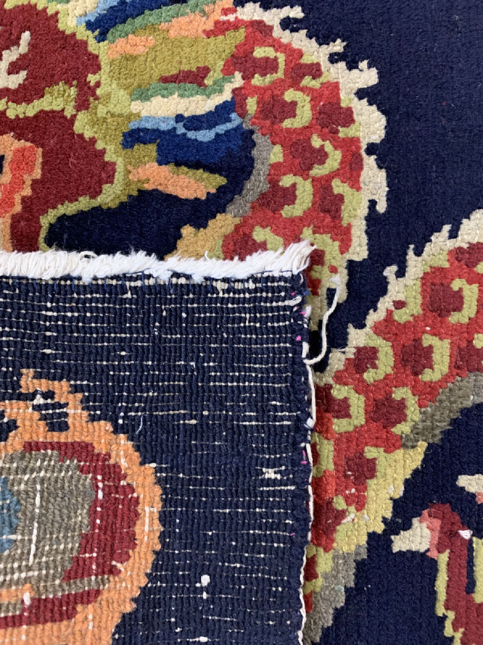 Detail c: Drachenteppich, Tibet, um 1940, Wolle auf Baumwolle, ca. 79 x 63 cm, EHZ: 2-3
