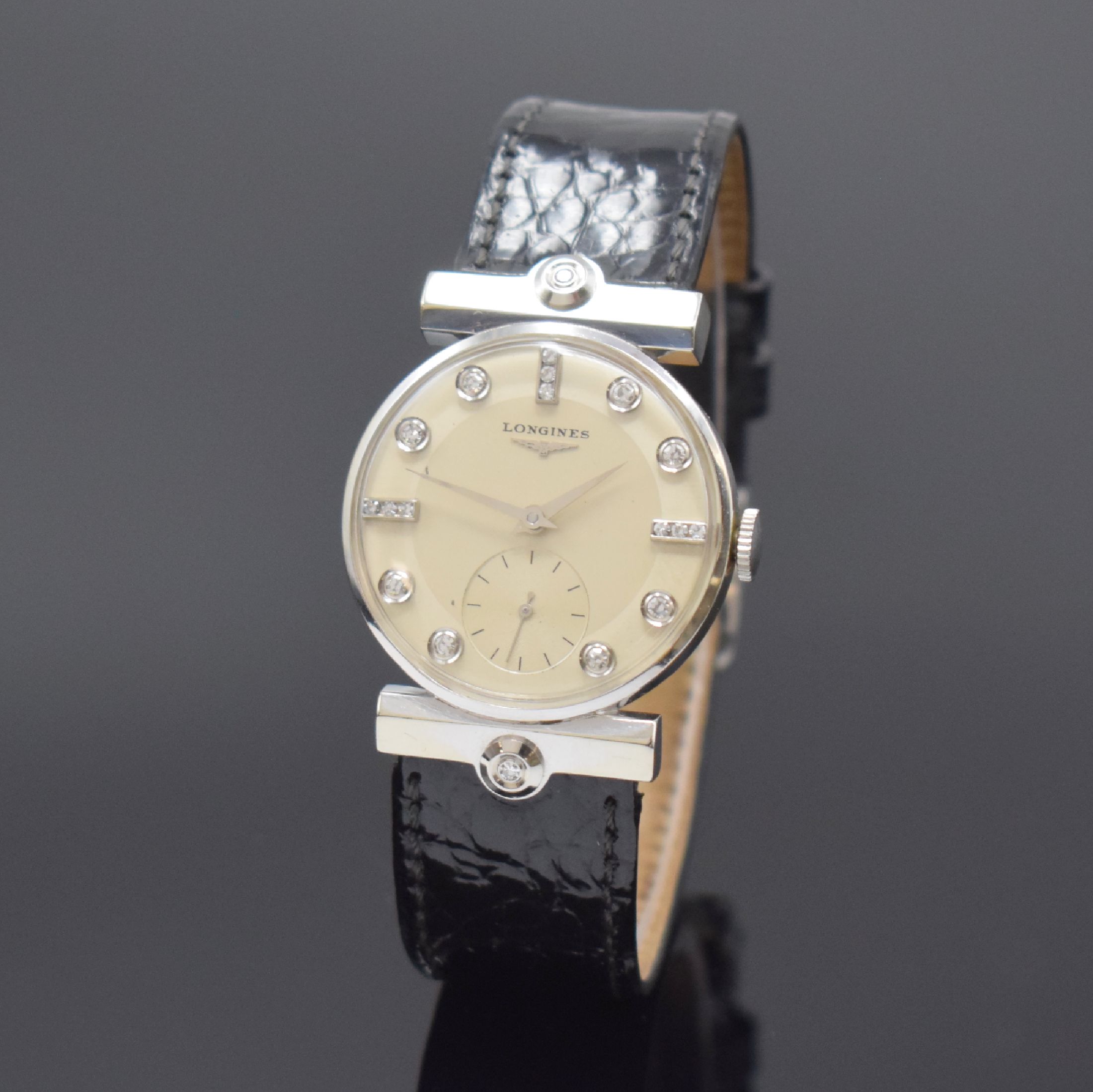 LONGINES Armbanduhr in WG 585/000 mit Diamanten, Schweiz/USA um 1952, Handaufzug, 2-tlg. Geh., Boden aufgedr., ausgefallene Bandanstöße m. ...