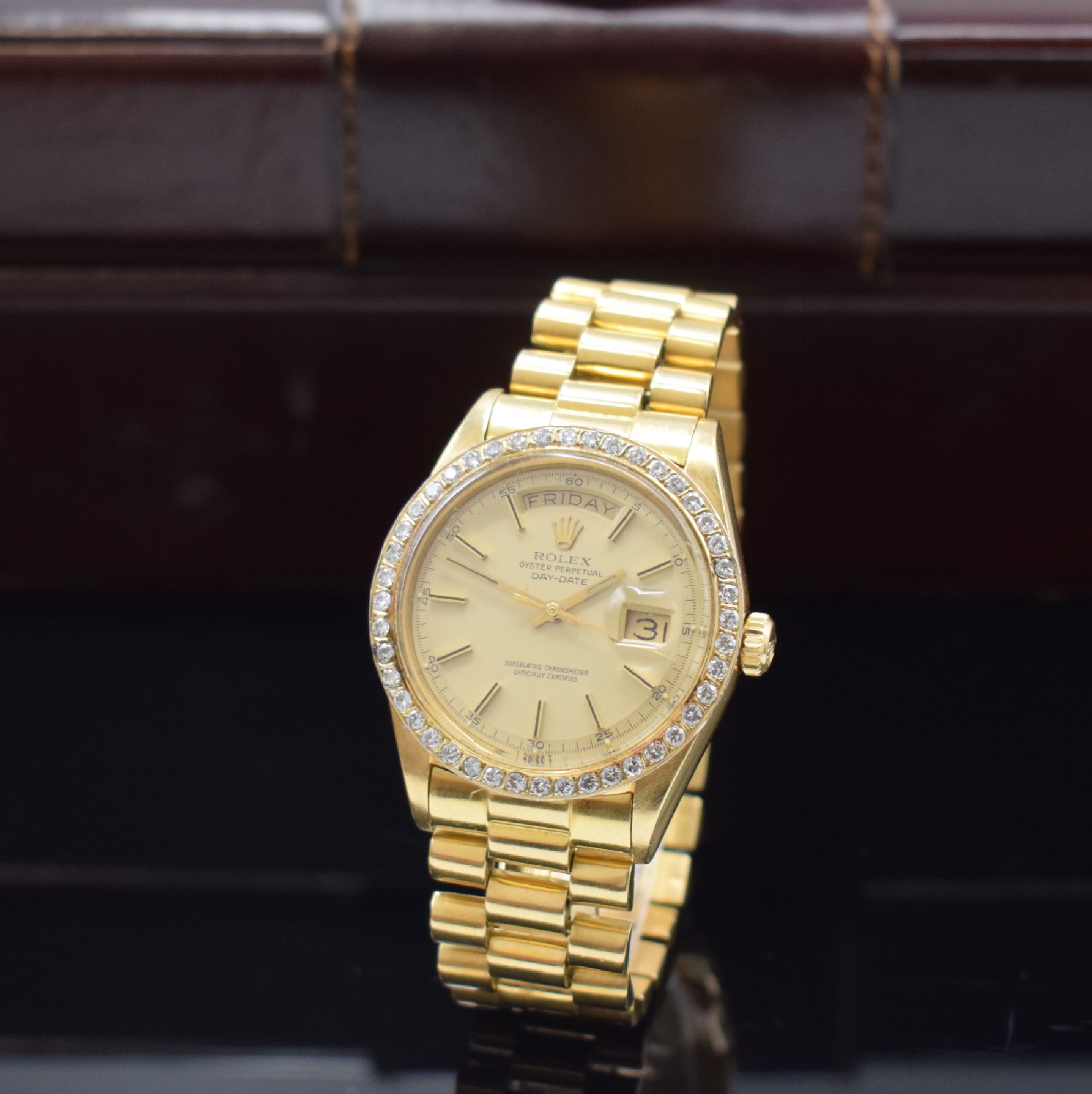 ROLEX Herrenarmbanduhr Oyster Perpetual Day- Date in GG 750/000 Referenz 1803, Schweiz um 1973, Automatik, Chronometer der Superlative, ...