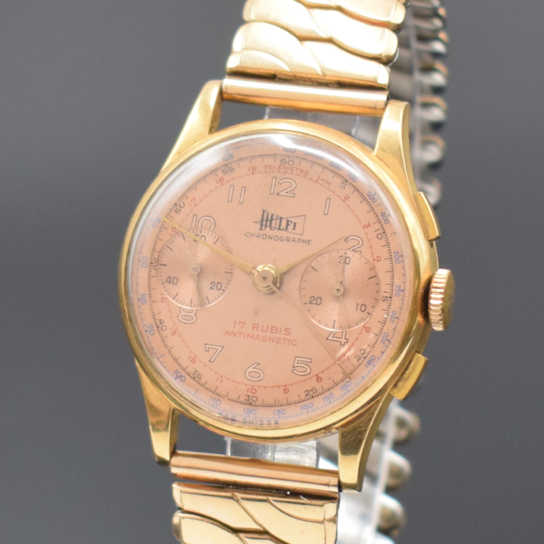 Detail a: DULFI Chronographe Herrenarmbanduhr in RG 750/000, Schweiz um 1950, Handaufzug, 3- teil. Geh., Boden u. Glasrand aufgedr., kupferfarb. Zifferbl. m. ...