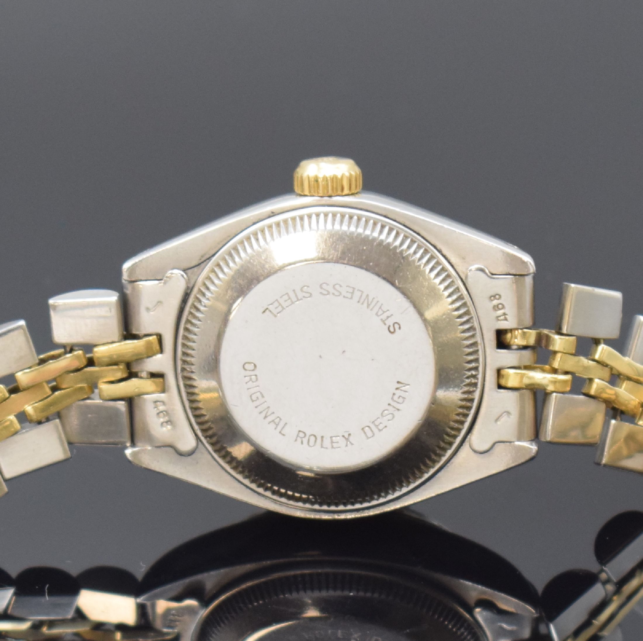 Detail d: ROLEX Damenarmbanduhr Oyster Perpetual Date Referenz 6917, Schweiz um 1982, Automatik, Edelstahl u. Gold komb., Jubileeband mit Faltschl., Boden und ...