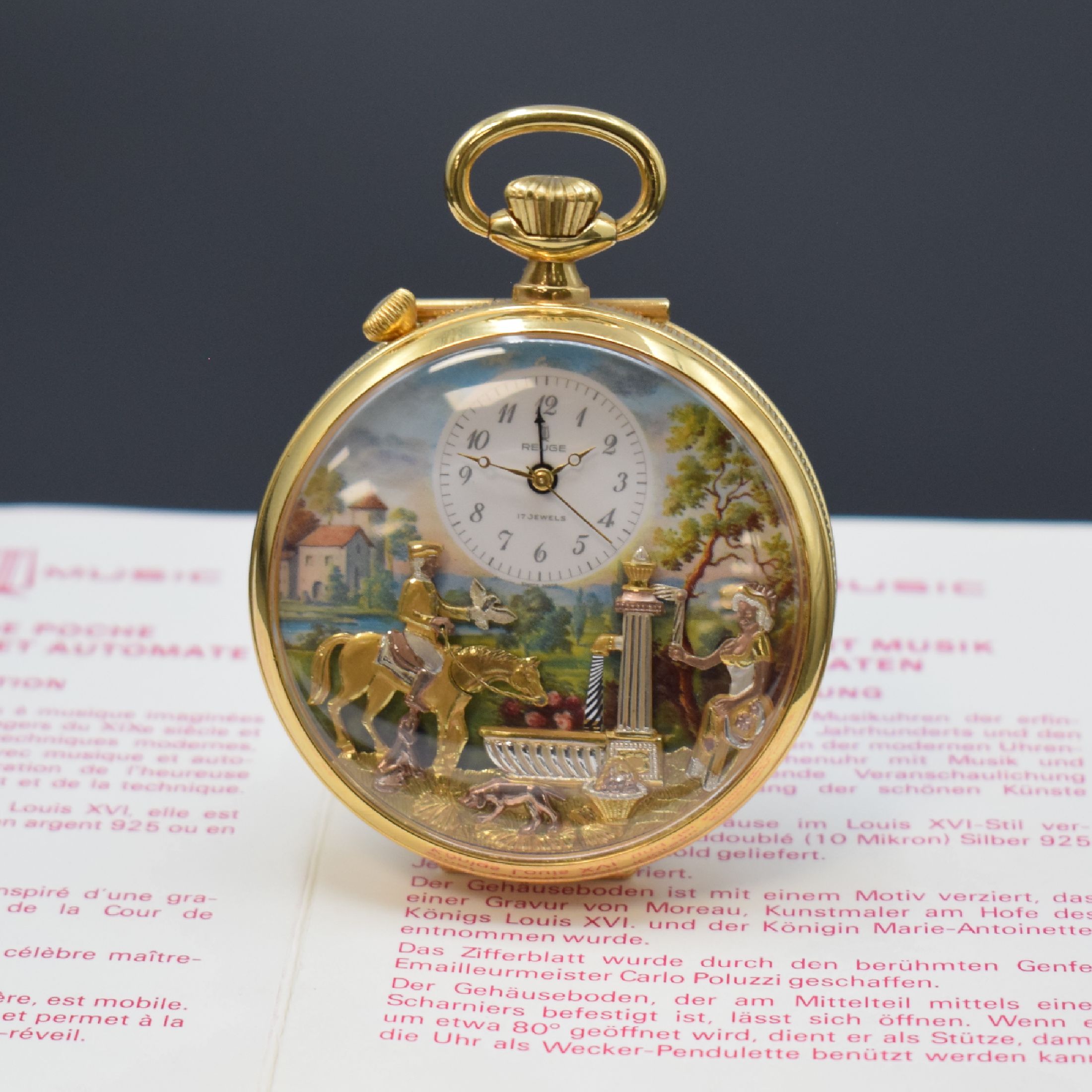 REUGE Taschenuhr mit Wecker-Spieluhr und Figurenautomat, Schweiz um 1990, verg. Geh., Rückdeckel m. grav. Musikinstrumenten, weißes Zifferbl. b. ...