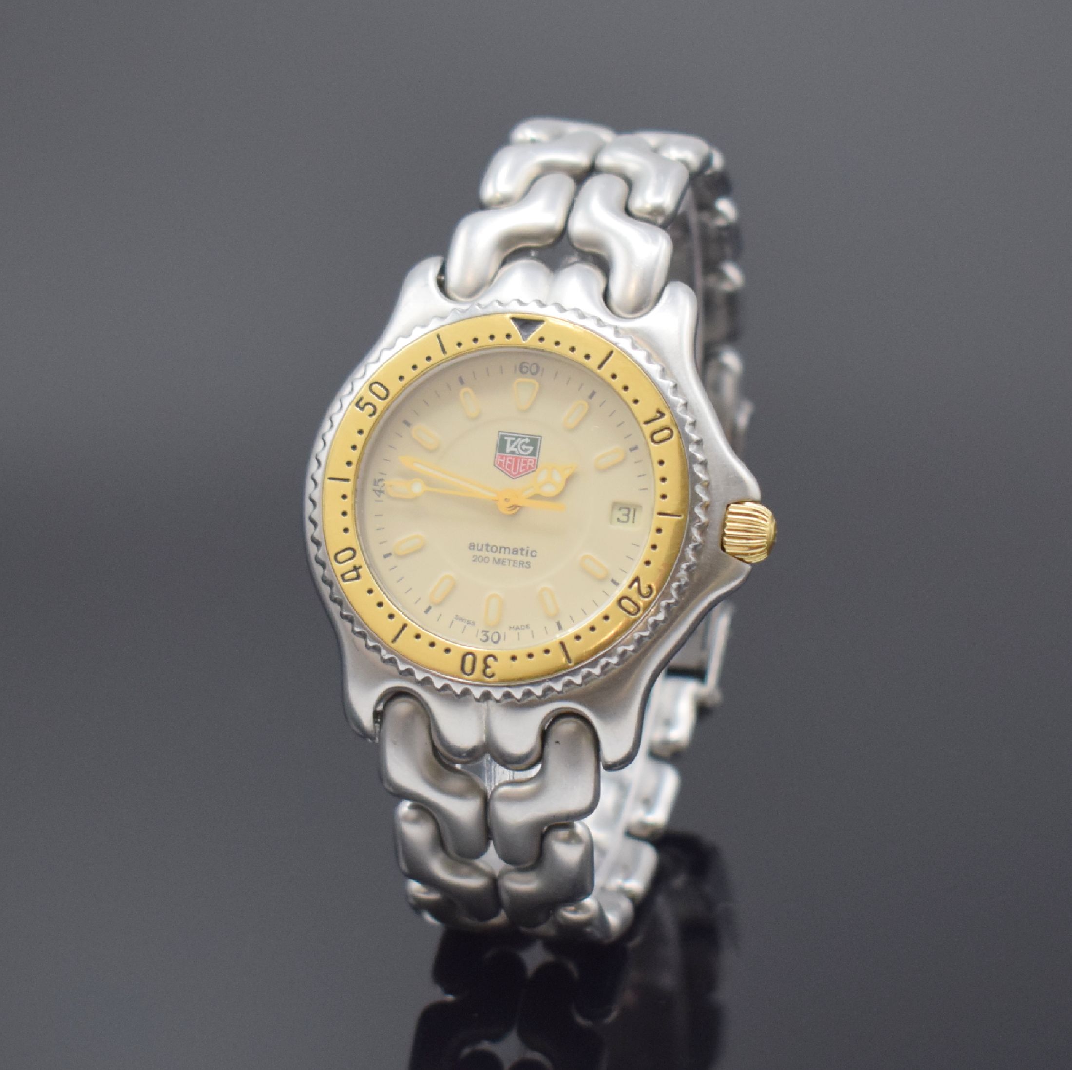 TAG HEUER Armbanduhr Referenz S 87.006 E in Stahl/Gold, Schweiz um 1995, Automatik, orig. Stahlband m. Faltschl., Boden u. Krone verschr., Lünette ...