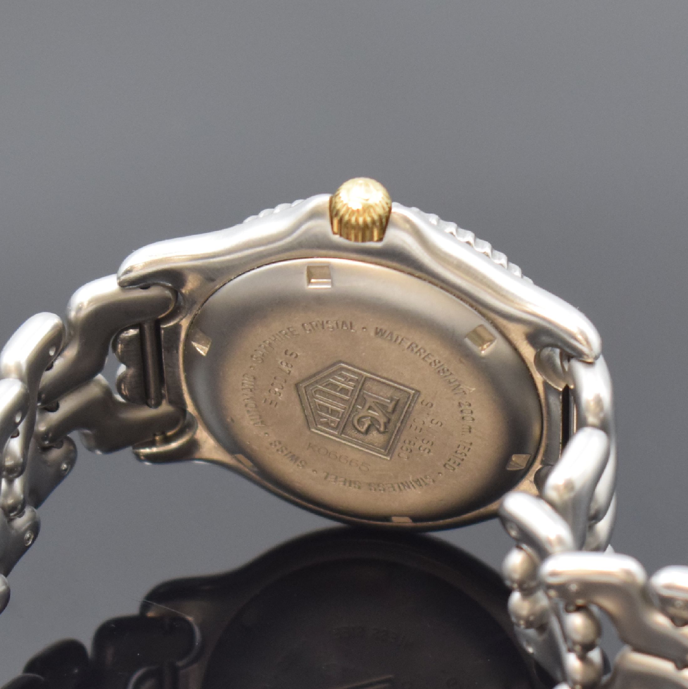 Detail d: TAG HEUER Armbanduhr Referenz S 87.006 E in Stahl/Gold, Schweiz um 1995, Automatik, orig. Stahlband m. Faltschl., Boden u. Krone verschr., Lünette ...