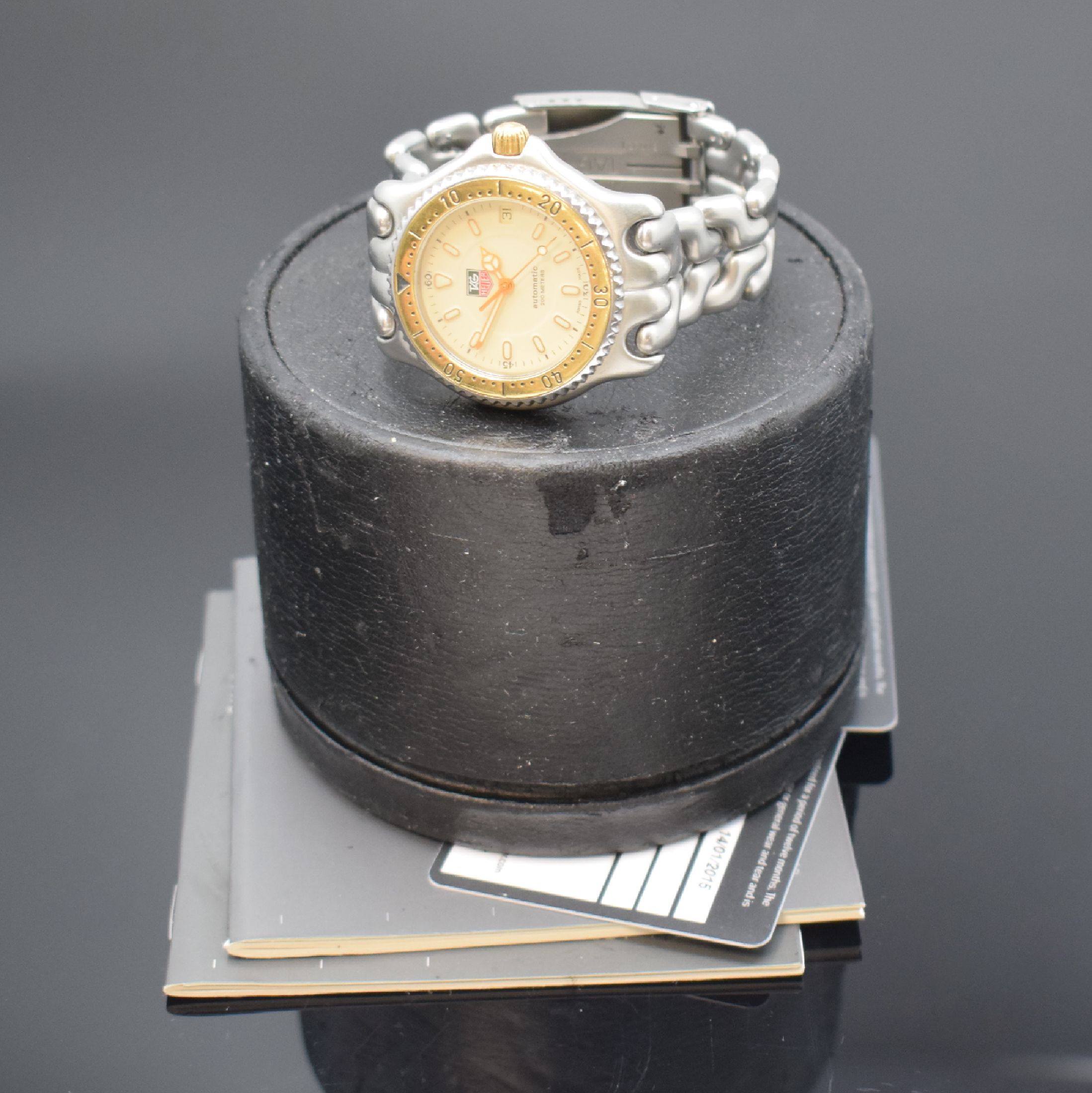 Detail e: TAG HEUER Armbanduhr Referenz S 87.006 E in Stahl/Gold, Schweiz um 1995, Automatik, orig. Stahlband m. Faltschl., Boden u. Krone verschr., Lünette ...
