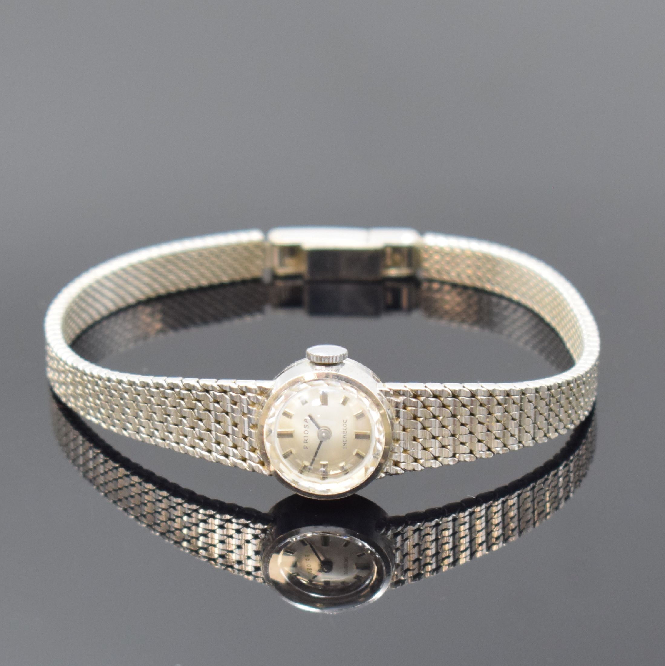 PRIOSA Damenarmbanduhr in WG 585/000, Schweiz um 1968, Handaufzug, 2-teil. Gehäuse, Boden aufgedr., Milanaiseband, silb. Zifferbl. m. aufges. ...