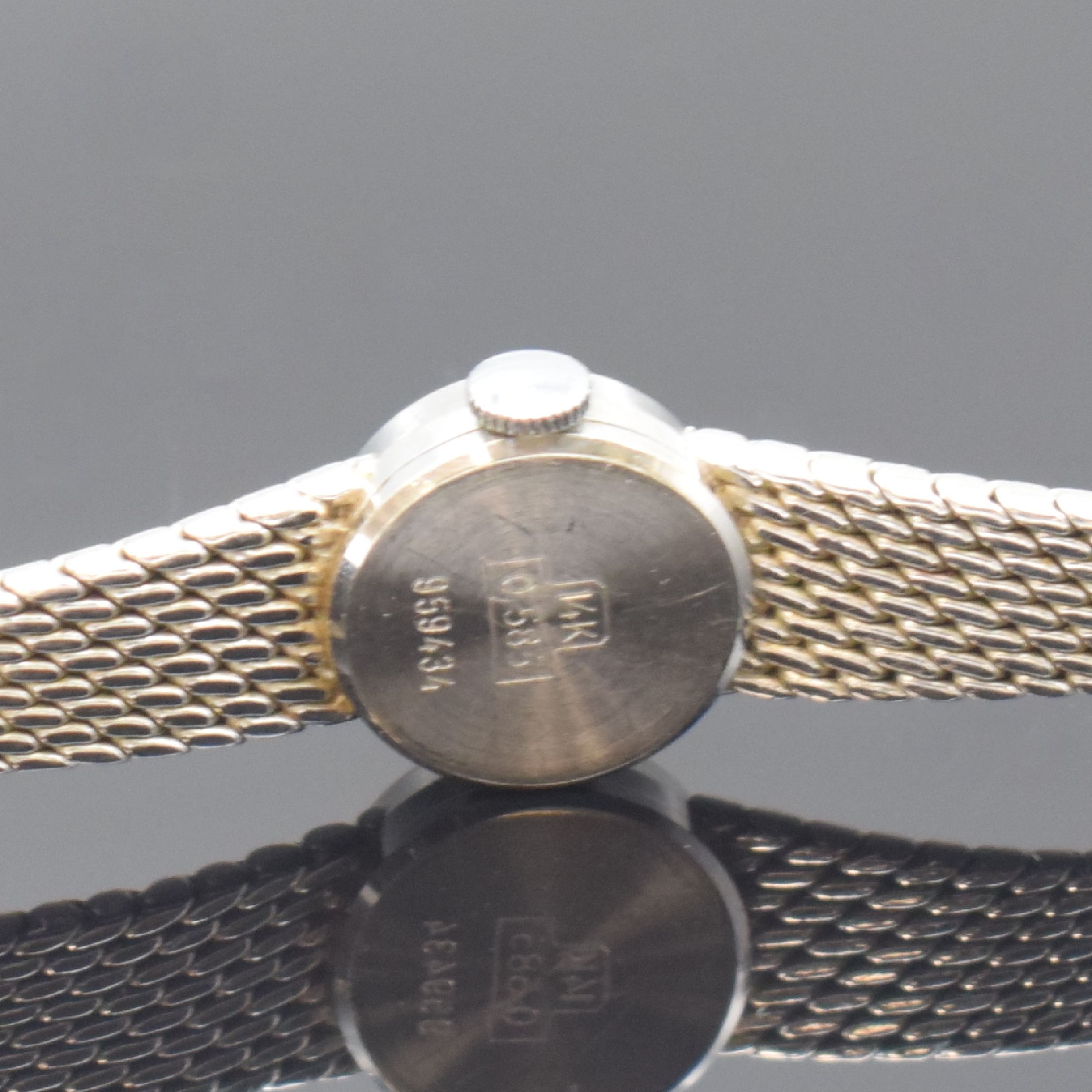 Detail d: PRIOSA Damenarmbanduhr in WG 585/000, Schweiz um 1968, Handaufzug, 2-teil. Gehäuse, Boden aufgedr., Milanaiseband, silb. Zifferbl. m. aufges. ...