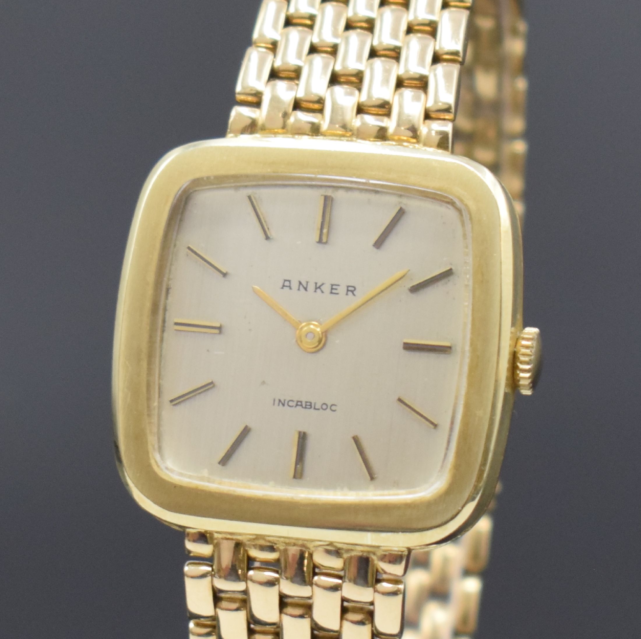 Detail a: ANKER Herrenarmbanduhr in GG 585/000 inklusive Goldband, Schweiz um 1965, Handaufzug, 2- teil. Gehäuse, Boden aufgedr., silb. Zifferbl.m. aufges. ...