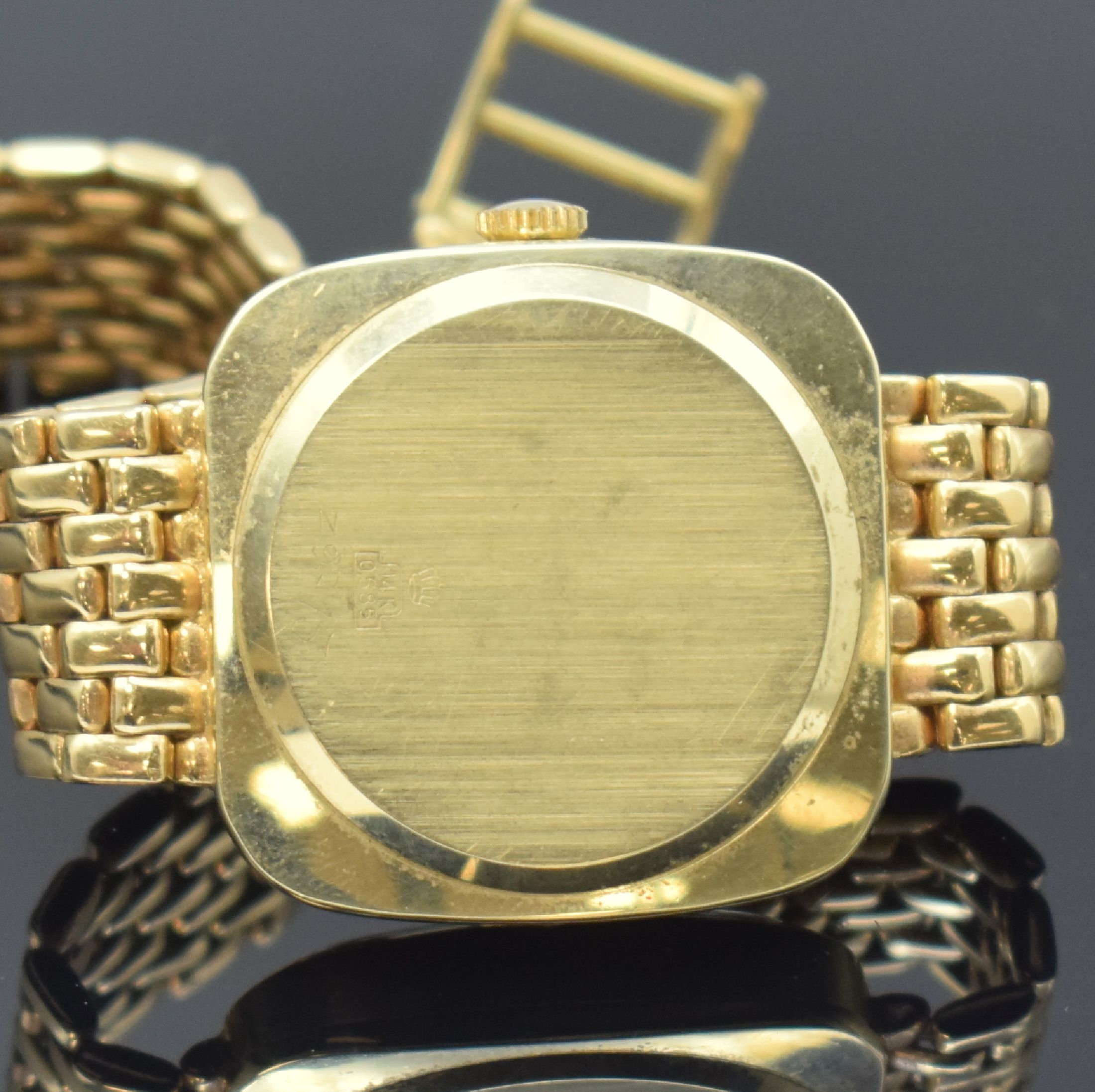 Detail d: ANKER Herrenarmbanduhr in GG 585/000 inklusive Goldband, Schweiz um 1965, Handaufzug, 2- teil. Gehäuse, Boden aufgedr., silb. Zifferbl.m. aufges. ...