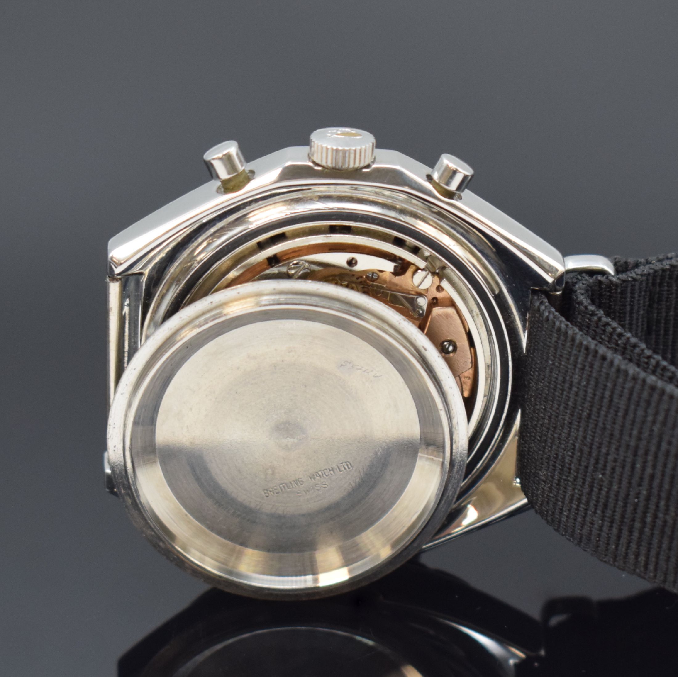 Detail e: BREITLING Navitimer Herrenarmbanduhr mit Chronograph Referenz 816, Schweiz um 1967, Handaufzug, Stahlgehäuse mit geschr. Boden, schwarzes Zifferbl., ...