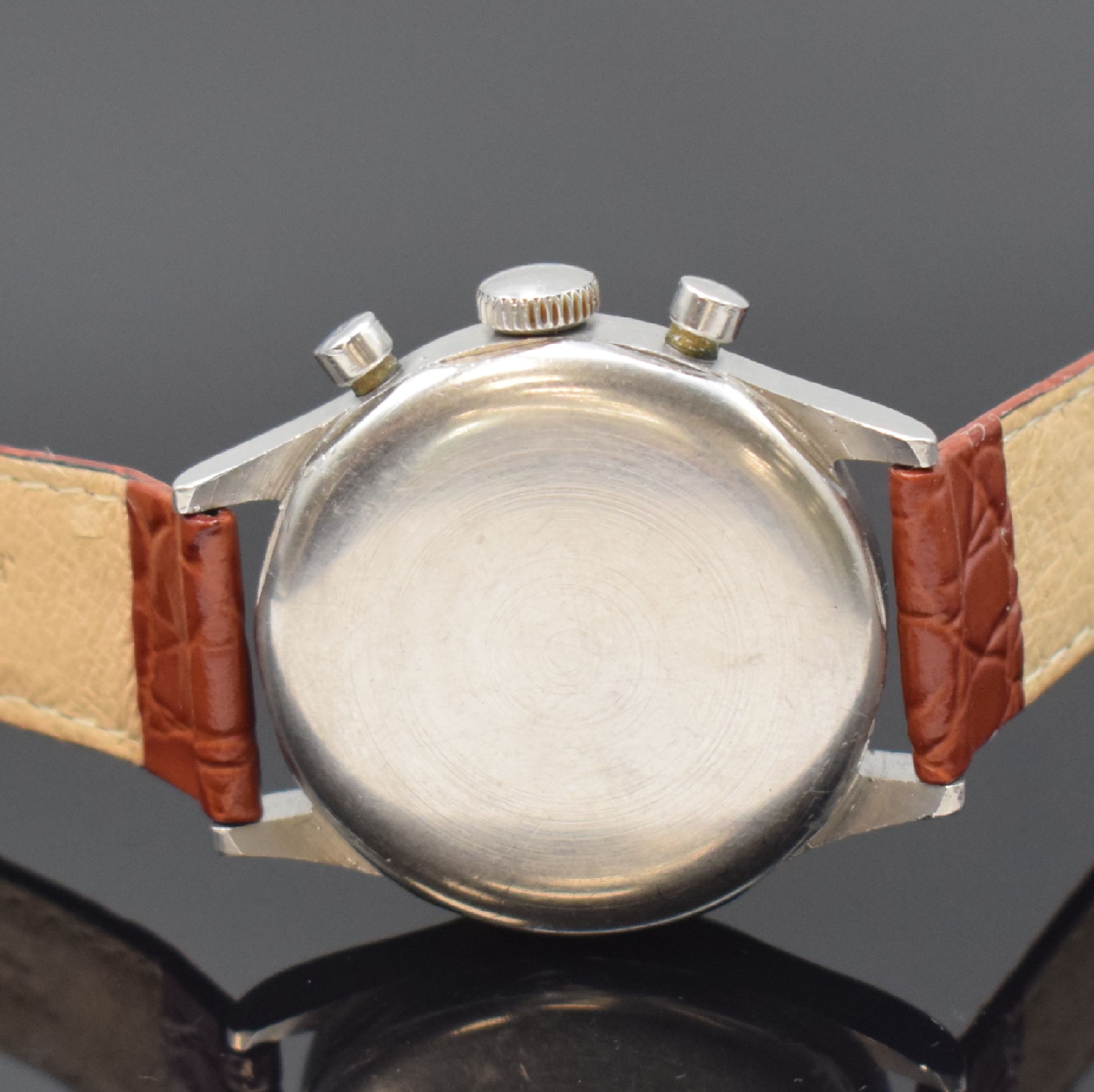 Detail c: HEUER Chronograph mit Kaliber Valjoux 23, Schweiz um 1950, Handaufzug, sign. Stahlgeh. m. geschr. Boden, rest. Zifferbl., gold. Zeiger, sign. Werk ...