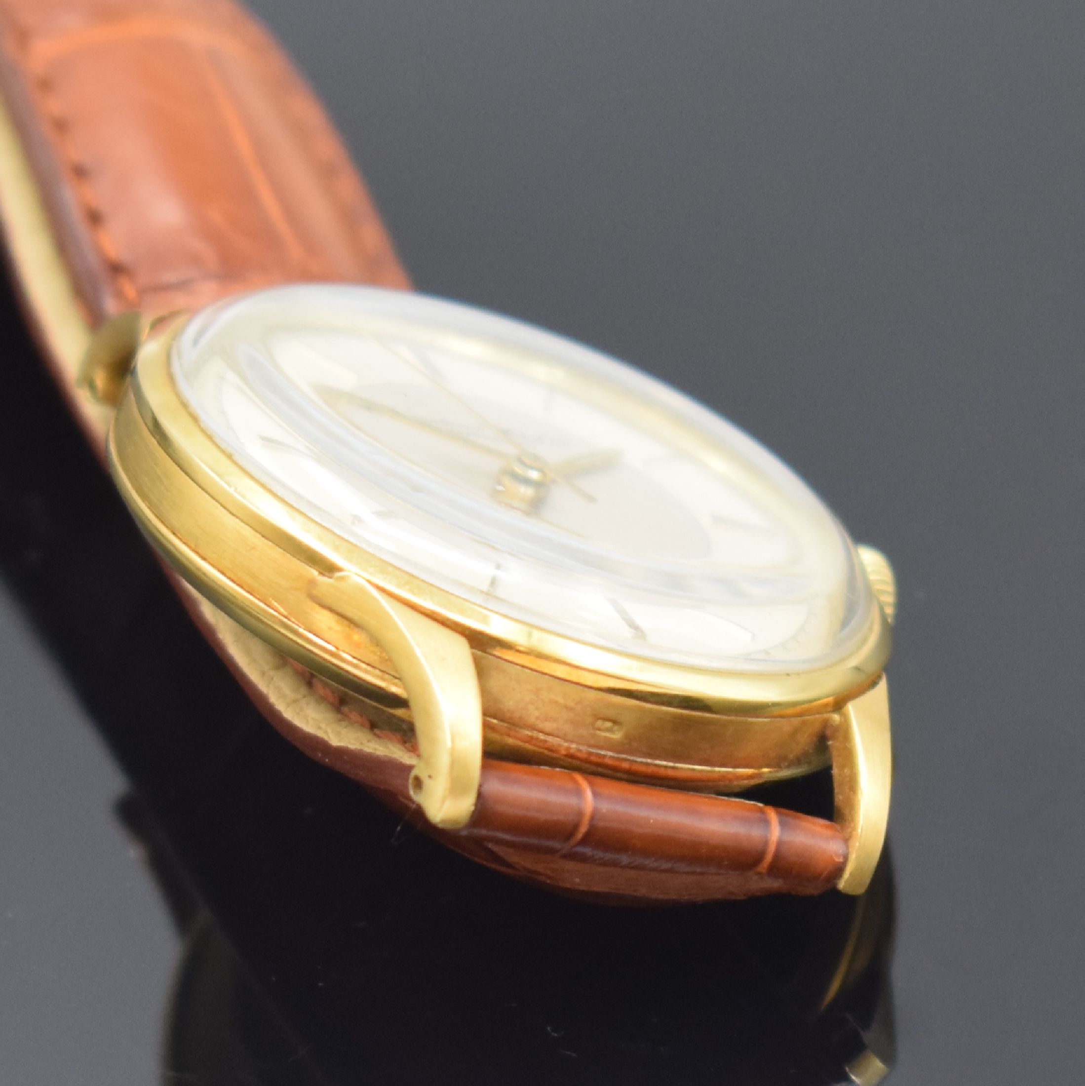 Detail c: IWC Herrenarmbanduhr in GG 750/000 Kaliber 853, Schweiz um 1962, Automatik, 3-teil. Gehäuse, Boden u. Glasrand aufgedr., silb. Zifferbl. rest., ...