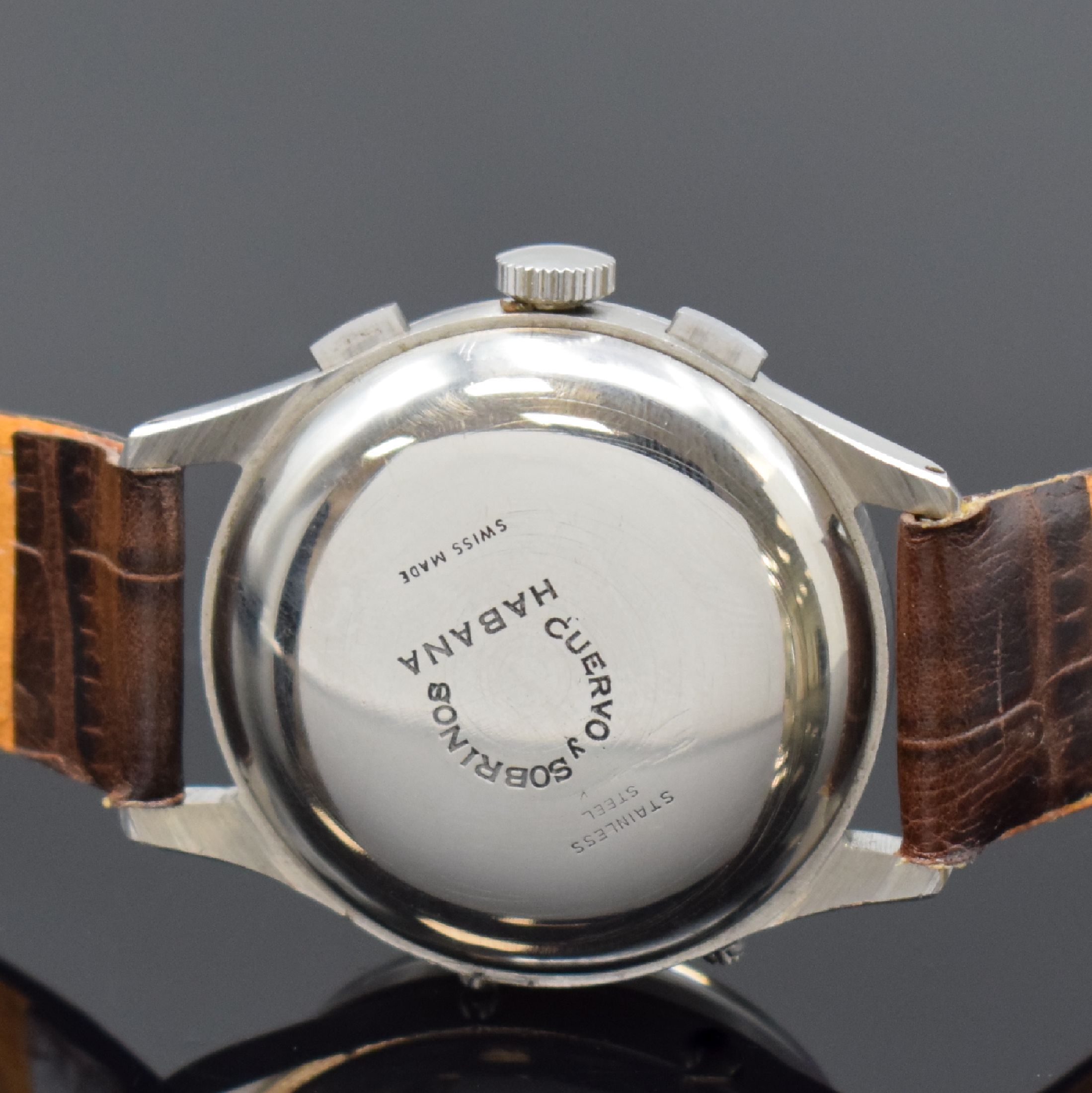 Detail c: Herrenarmbanduhr Kaliber Valjoux 72C mit Chronograph und Kalender, Schweiz um 1950, Handaufzug, Zifferblatt u. Gehäuse mit nachtr. Signatur, 3-teil. ...