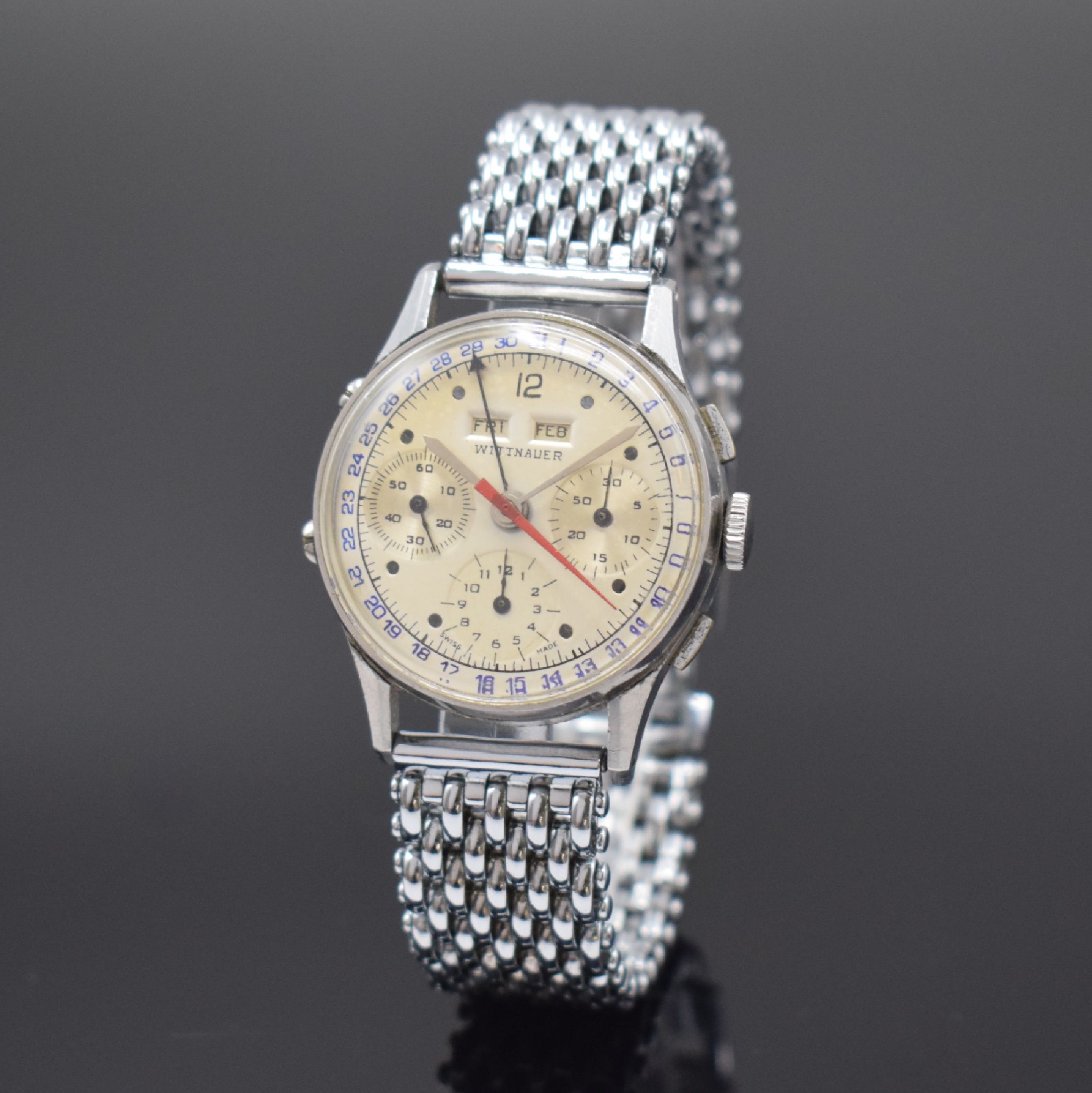 WITTNAUER Herrenarmbanduhr mit Chronograph und Kalender Kaliber 72C, Schweiz um 1950, Handaufzug, verchr. Gehäuse, sign. Stahlboden aufgedr., silb. ...