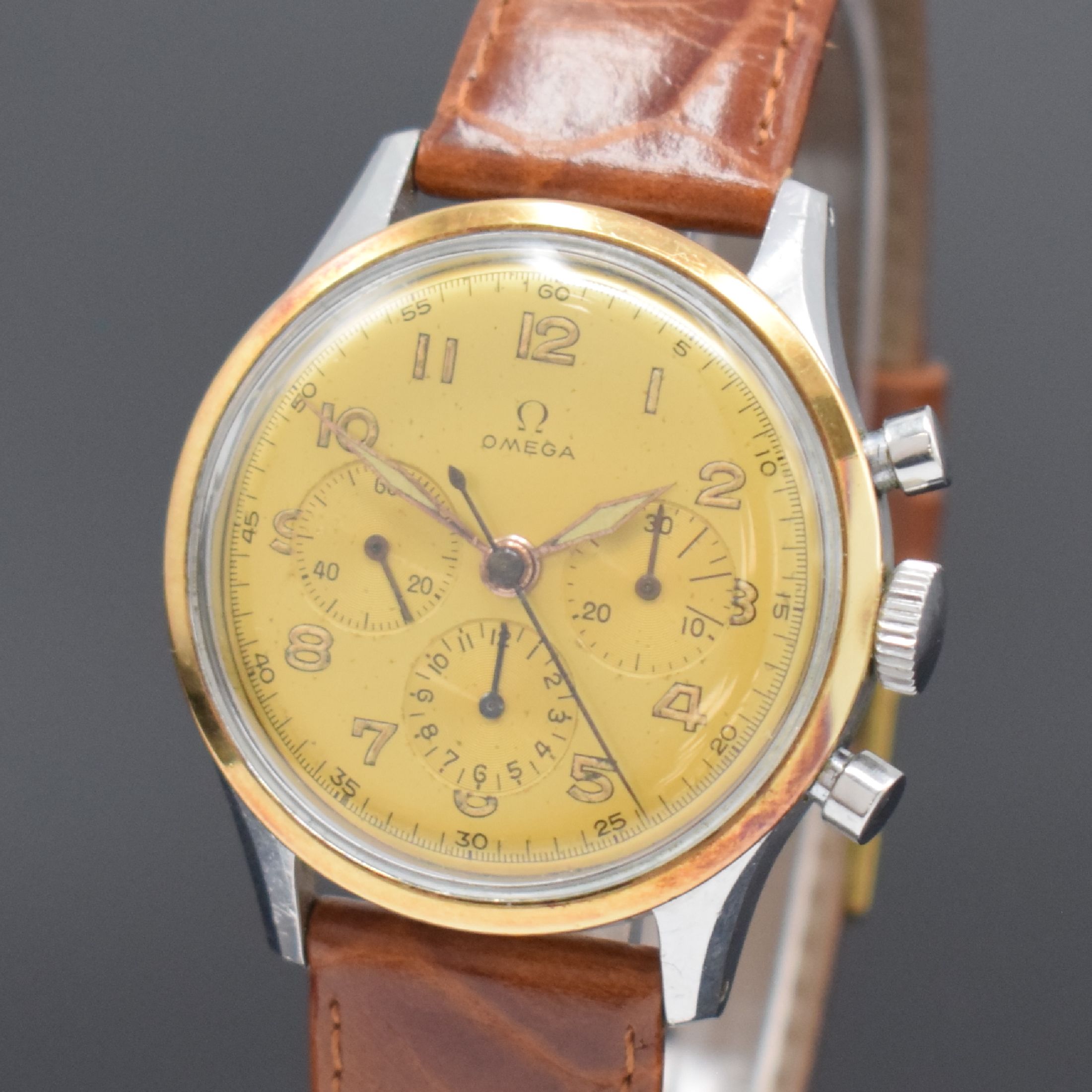 Detail a: OMEGA seltene Herrenarmbanduhr mit Chronograph Referenz 2451 174 / Kaliber CHRO C12 T2PC,Schweiz um 1947, Handaufzug, 2-teil. Gehäuse in Stahl, ...