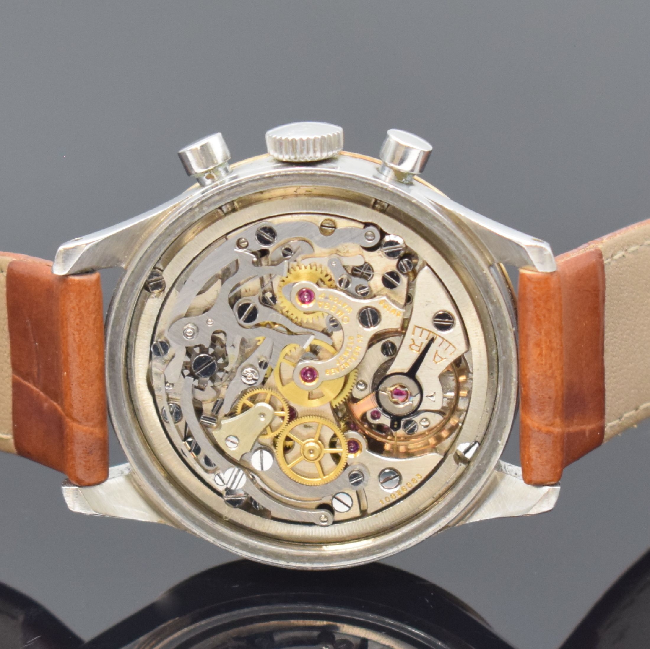 Detail e: OMEGA seltene Herrenarmbanduhr mit Chronograph Referenz 2451 174 / Kaliber CHRO C12 T2PC,Schweiz um 1947, Handaufzug, 2-teil. Gehäuse in Stahl, ...