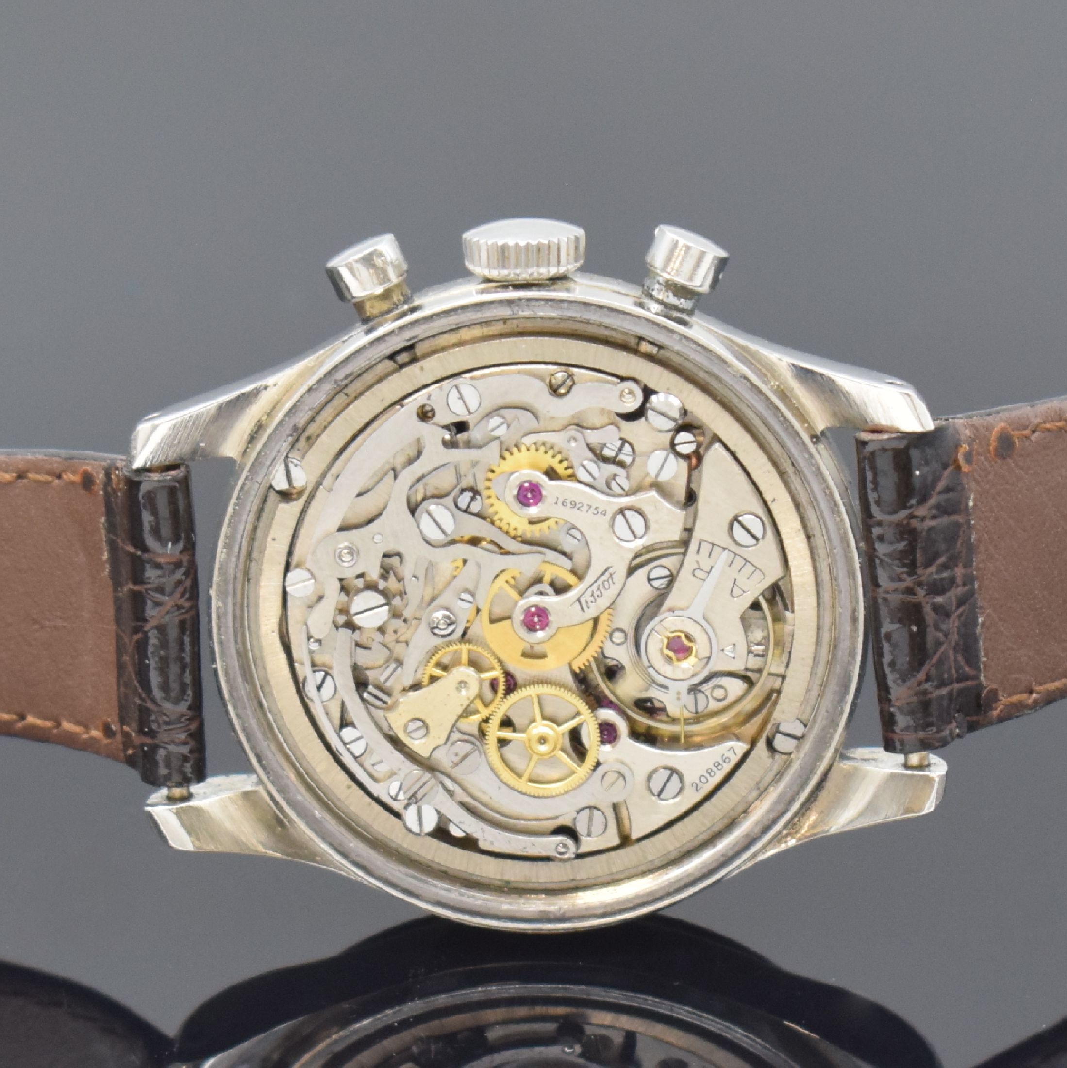 Detail d: TISSOT Referenz 6216-4 Herrenarmbanduhr mit Chronograph Kaliber C27-41H, Schweiz um 1950, Handaufzug, 2-tlg. sign. Geh. in Stahl, Boden verschr., ...
