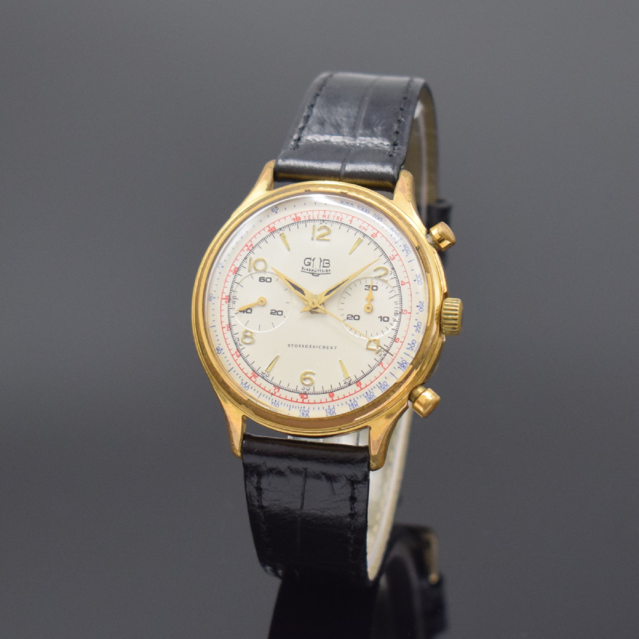 GUB Schaltradchronograph mit Flyback-Funktion Kaliber 64, Deutschland um 1960, Handaufzug, verg. Geh., Stahlboden geschr., rest. Zifferbl., 30 ...