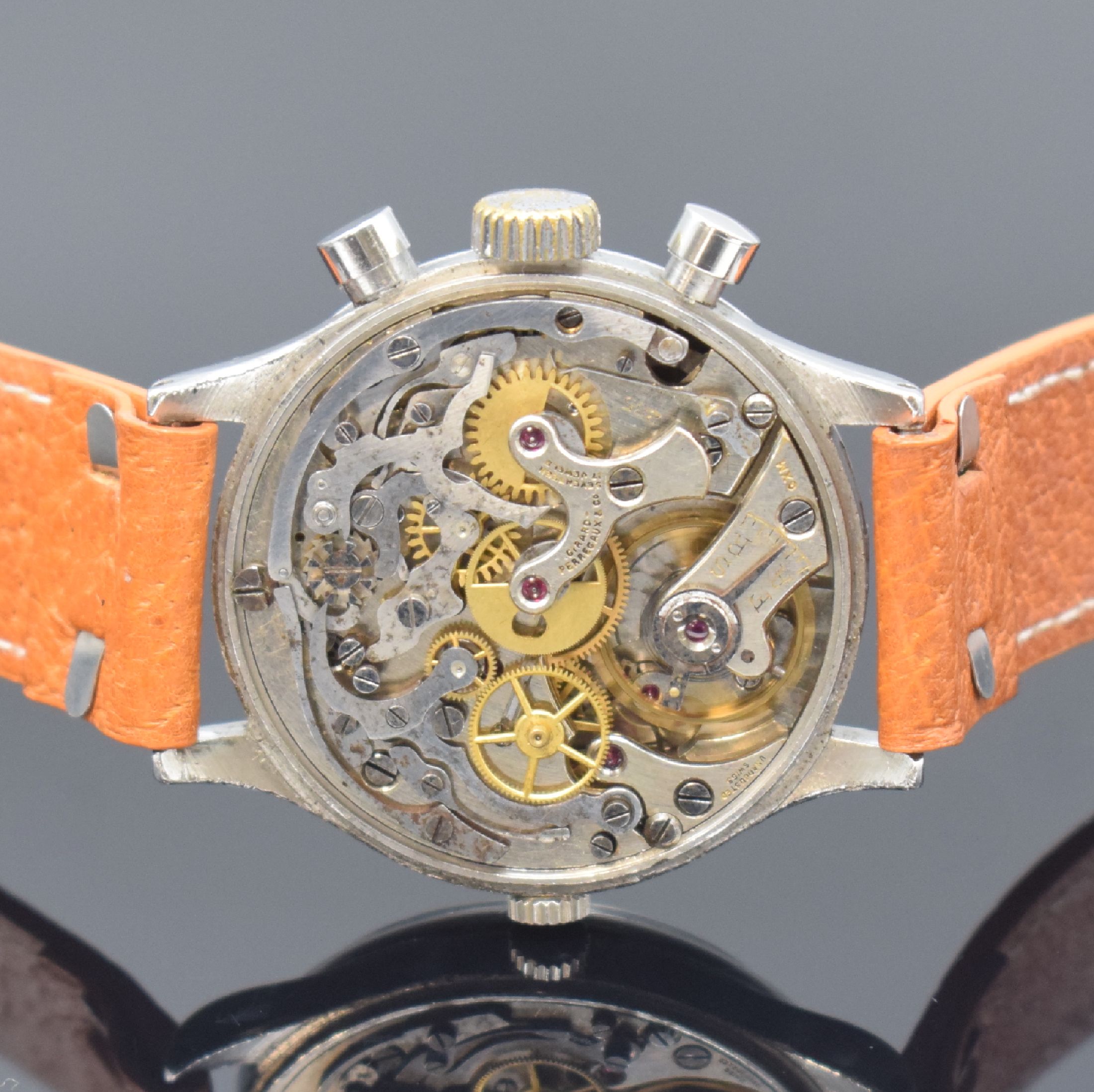 Detail e: GIRARD PERREGAUX Herrenarmbanduhr mit Chronograph in Stahl, Schweiz um 1945, Handaufzug, 3-teil. Gehäuse, Boden (neutr. ers.) u. Lünette aufgedr., ...