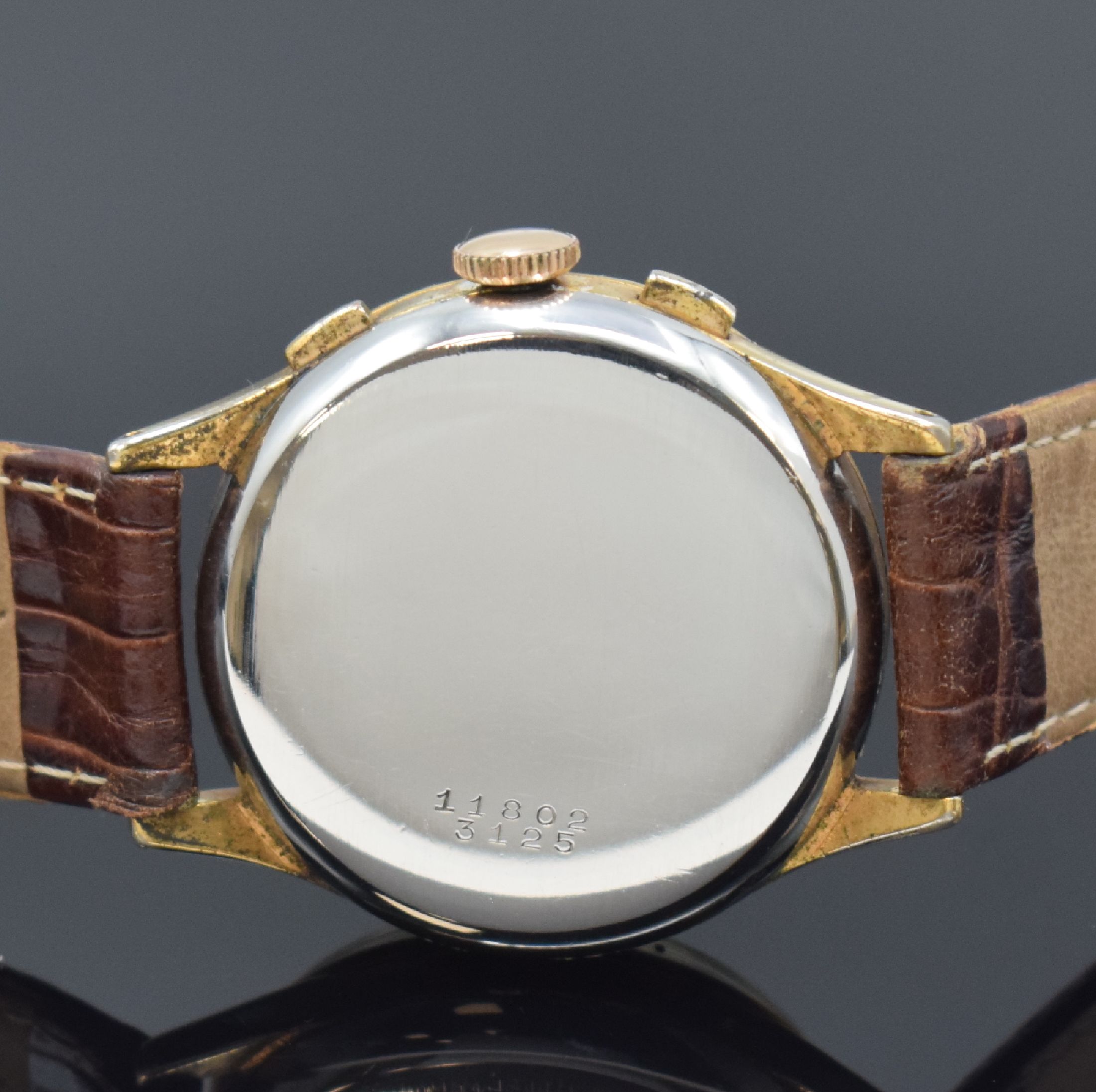 Detail d: GÜBELIN Herrenarmbanduhr mit Chronograph Kaliber Valjoux 72C Referenz 3125, Schweiz um 1945, Handaufzug, 2-teil. verg. Gehäuse, Stahlboden ...