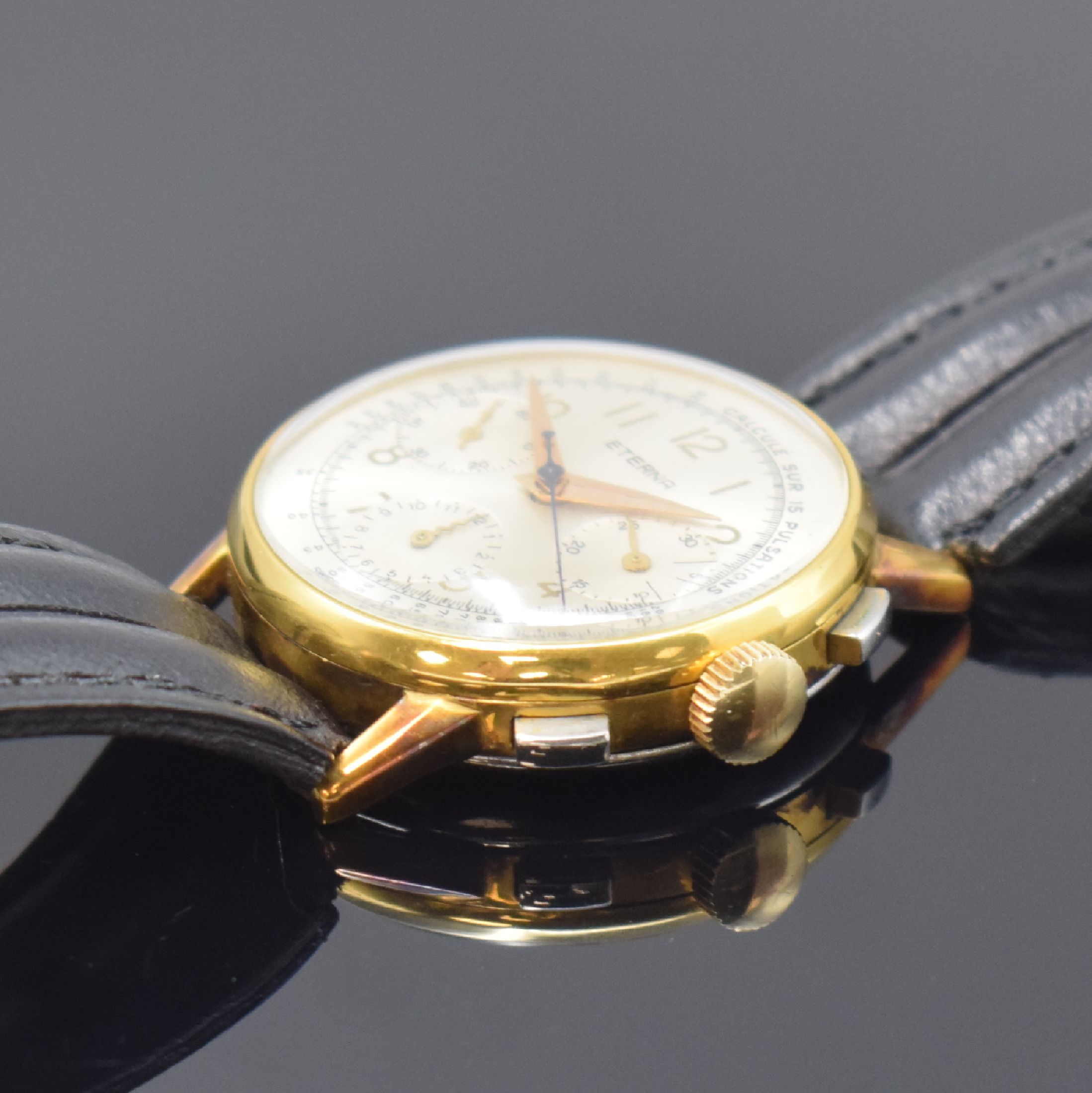 Detail b: ETERNA Herrenarmbanduhr mit Chronograph Kaliber E 704 / Valjoux 71, Schweiz um 1950, Handaufzug, verg. Gehäuse, sign. Stahlboden aufgedr., rest. ...