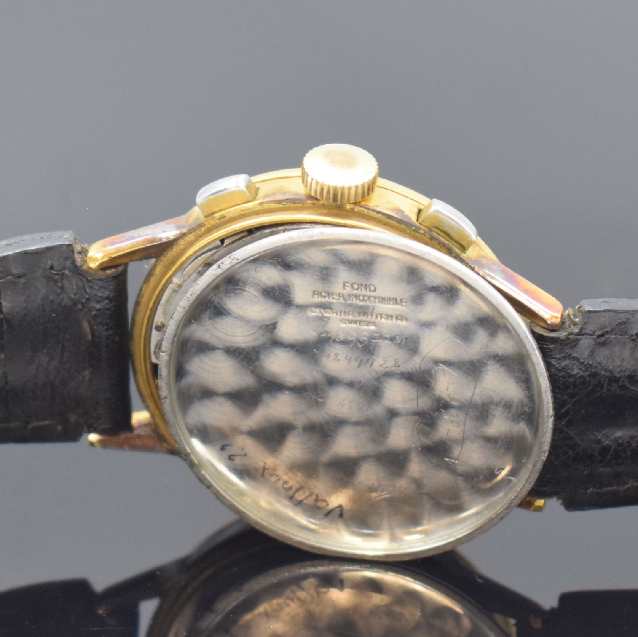Detail e: ETERNA Herrenarmbanduhr mit Chronograph Kaliber E 704 / Valjoux 71, Schweiz um 1950, Handaufzug, verg. Gehäuse, sign. Stahlboden aufgedr., rest. ...