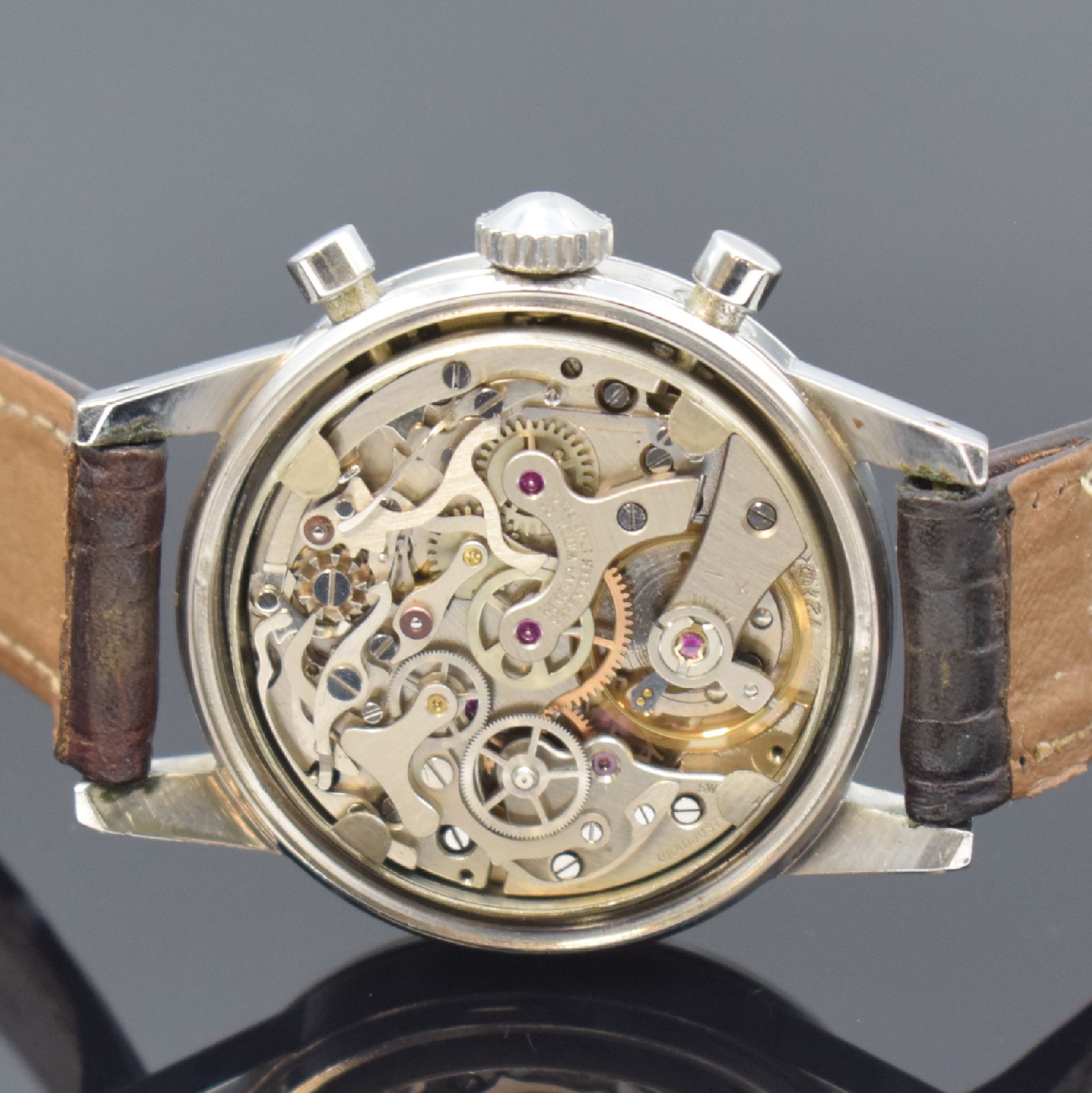 Detail d: MINERVA Herrenarmbanduhr mit Chronograph Referenz VD 712 Kaliber Valjoux 72, Schweiz um 1965, Handaufzug, 2-teil. Gehäuse in Stahl, sign. Boden ...