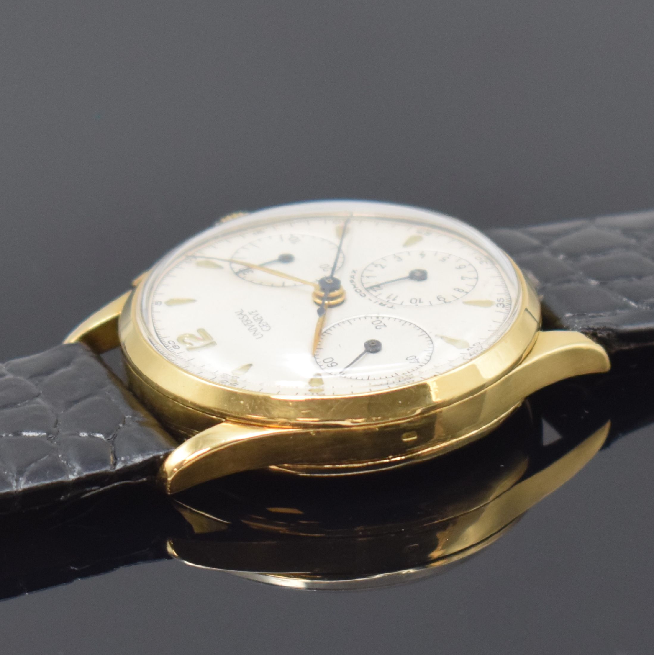 Detail c: UNIVERSAL GENEVE Herrenarmbanduhr in 750/000 GG mit Chronograph Referenz 12494, Schweiz um 1945, Handaufzug, 3-teil. sign. Gehäuse, Boden u. ...