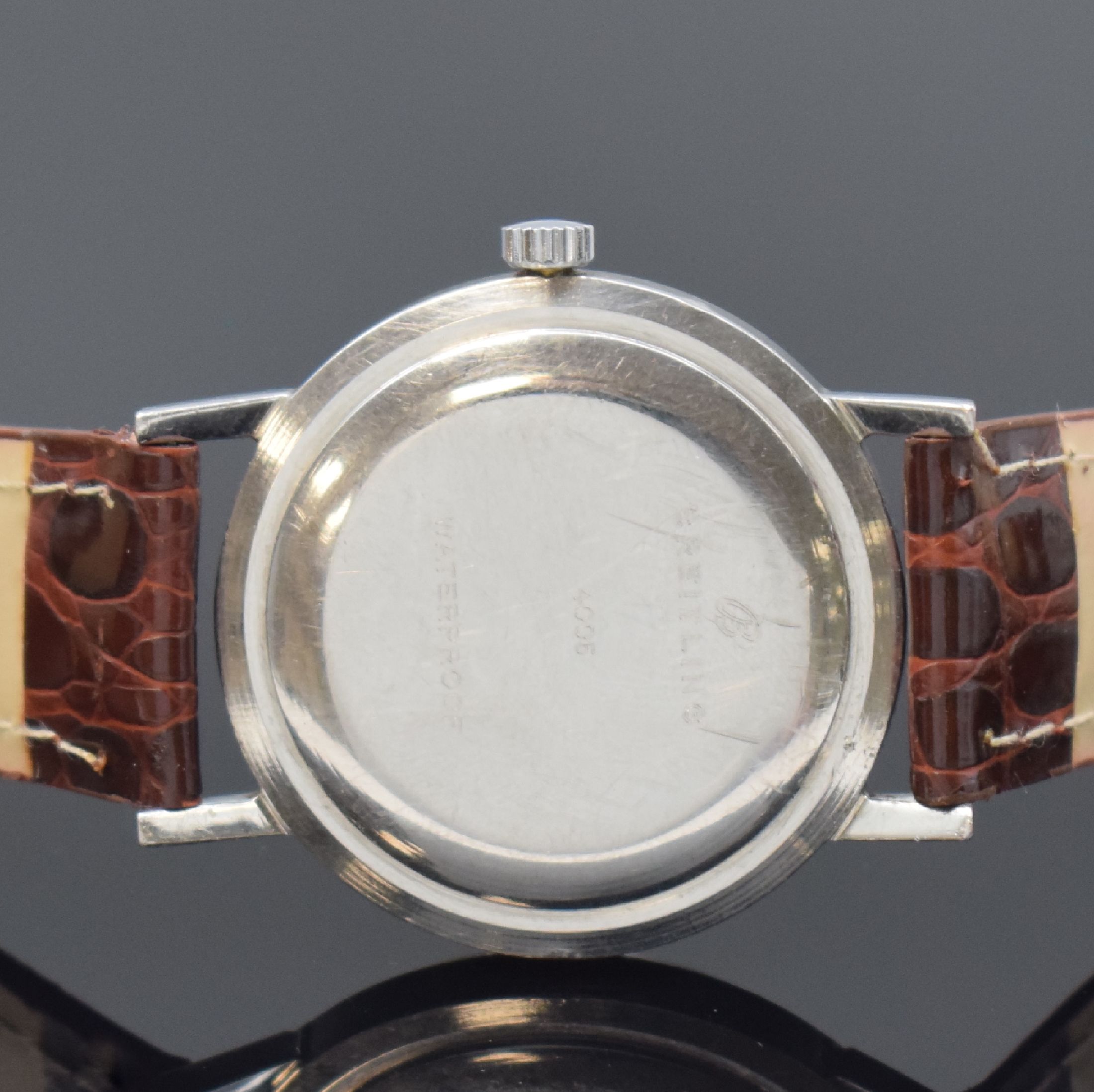 Detail c: BREITLING Herrenarmbanduhr Referenz 4005, Schweiz um 1960, Handaufzug, Monocoque-Geh. in Stahl, Zifferbl. mit aufges. Std.-Ind. altersbed. pat./fl., ...