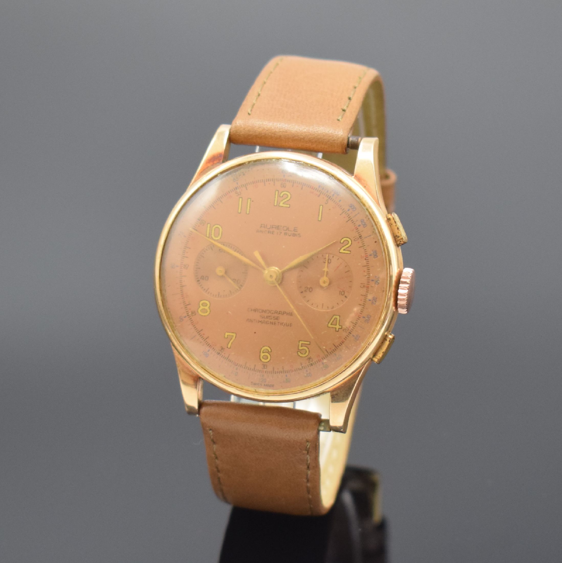CHRONOGRAPHE SUISSE / AUREOLE Herrenarmbanduhr mit Chronograph in RG 750/000, Schweiz um 1950, Handaufzug, 3-teil. Geh., Boden u. Glasrand aufgedr., ...