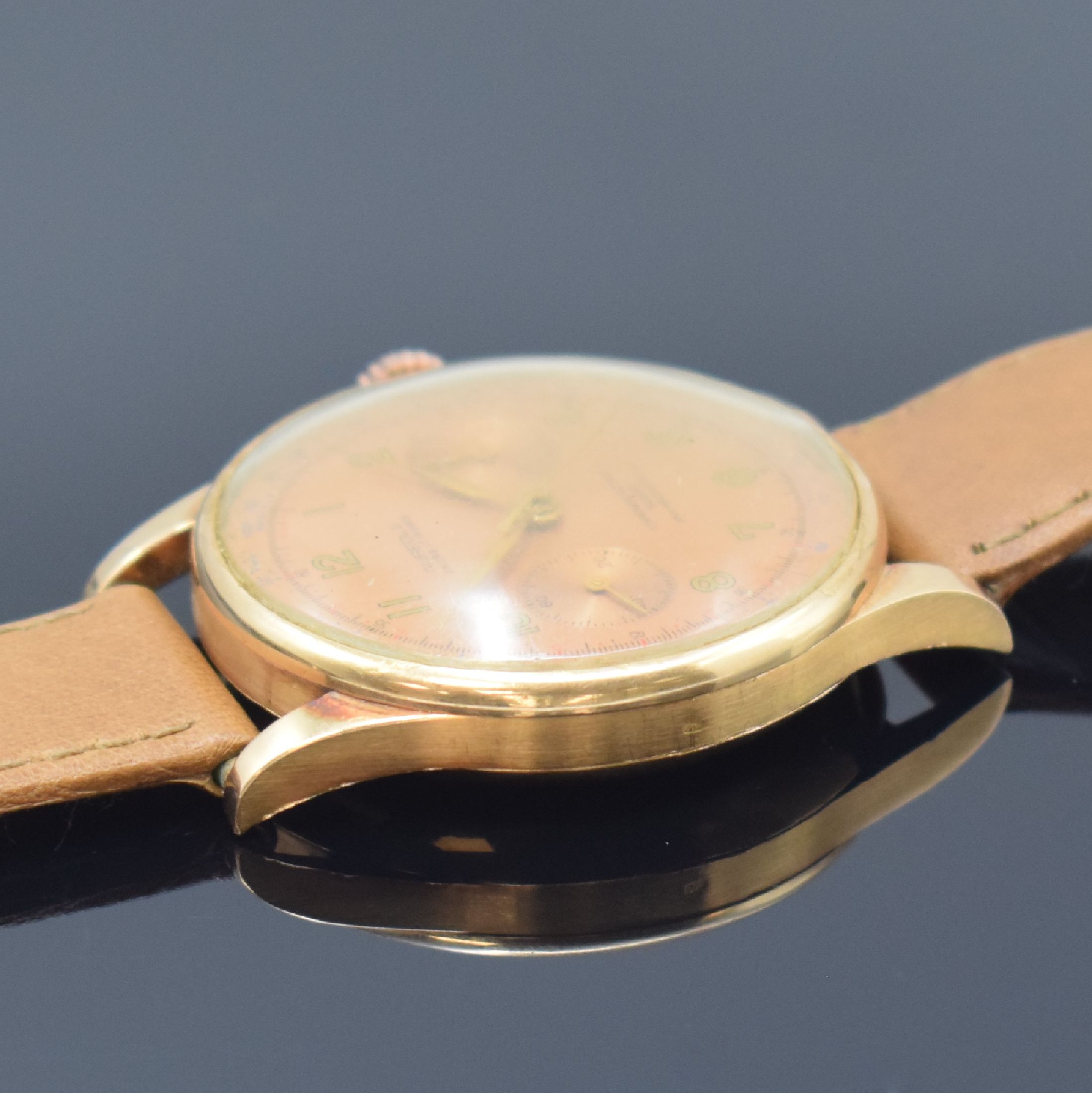 Detail d: CHRONOGRAPHE SUISSE / AUREOLE Herrenarmbanduhr mit Chronograph in RG 750/000, Schweiz um 1950, Handaufzug, 3-teil. Geh., Boden u. Glasrand aufgedr., ...