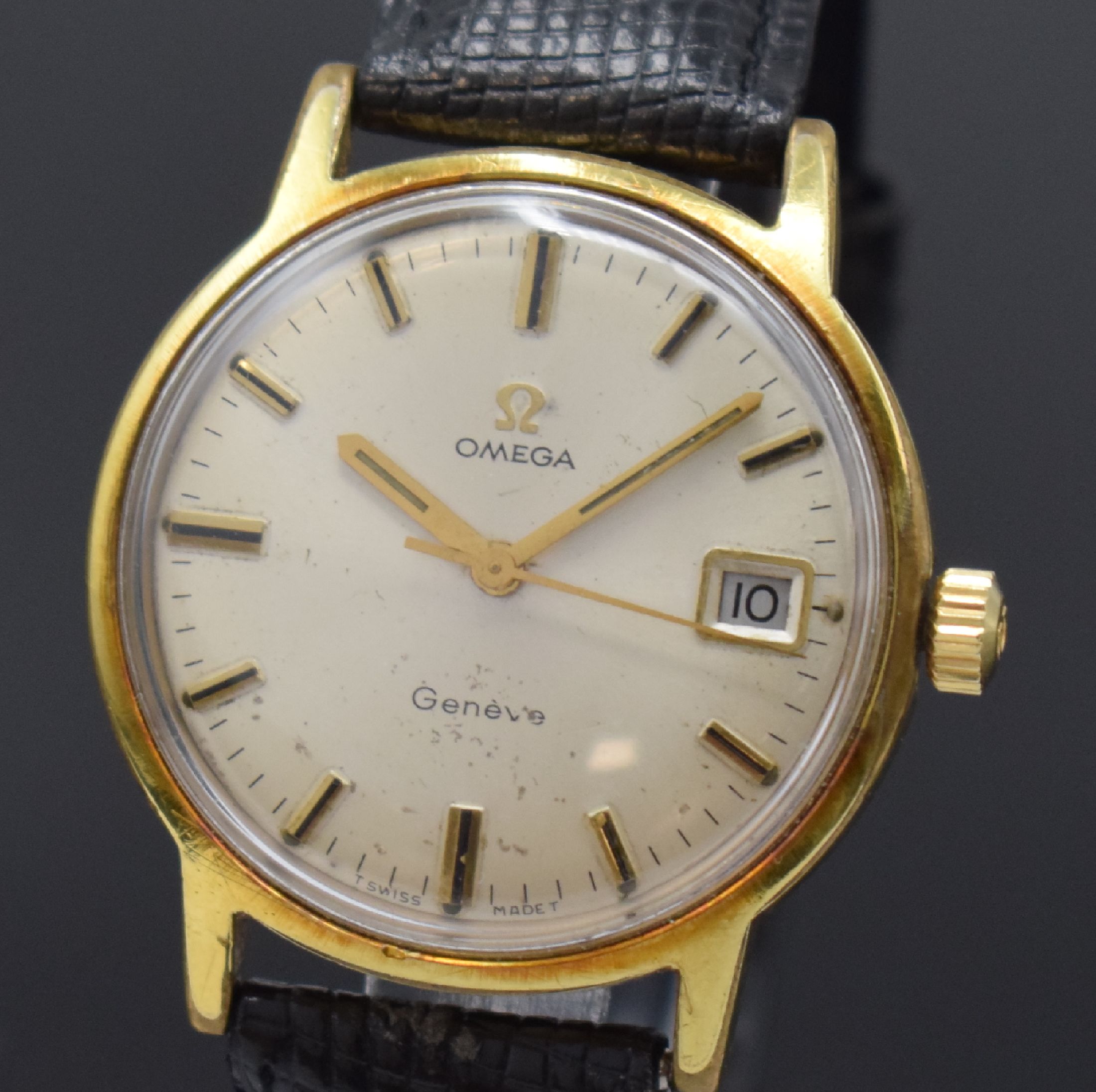 Detail a: OMEGA Geneve vergoldete Armbanduhr Referenz 136.070, Schweiz um 1969, Handaufzug, Boden verschr., silb. Zifferbl. fl., aufgel. Std.- Ind., gold. ...