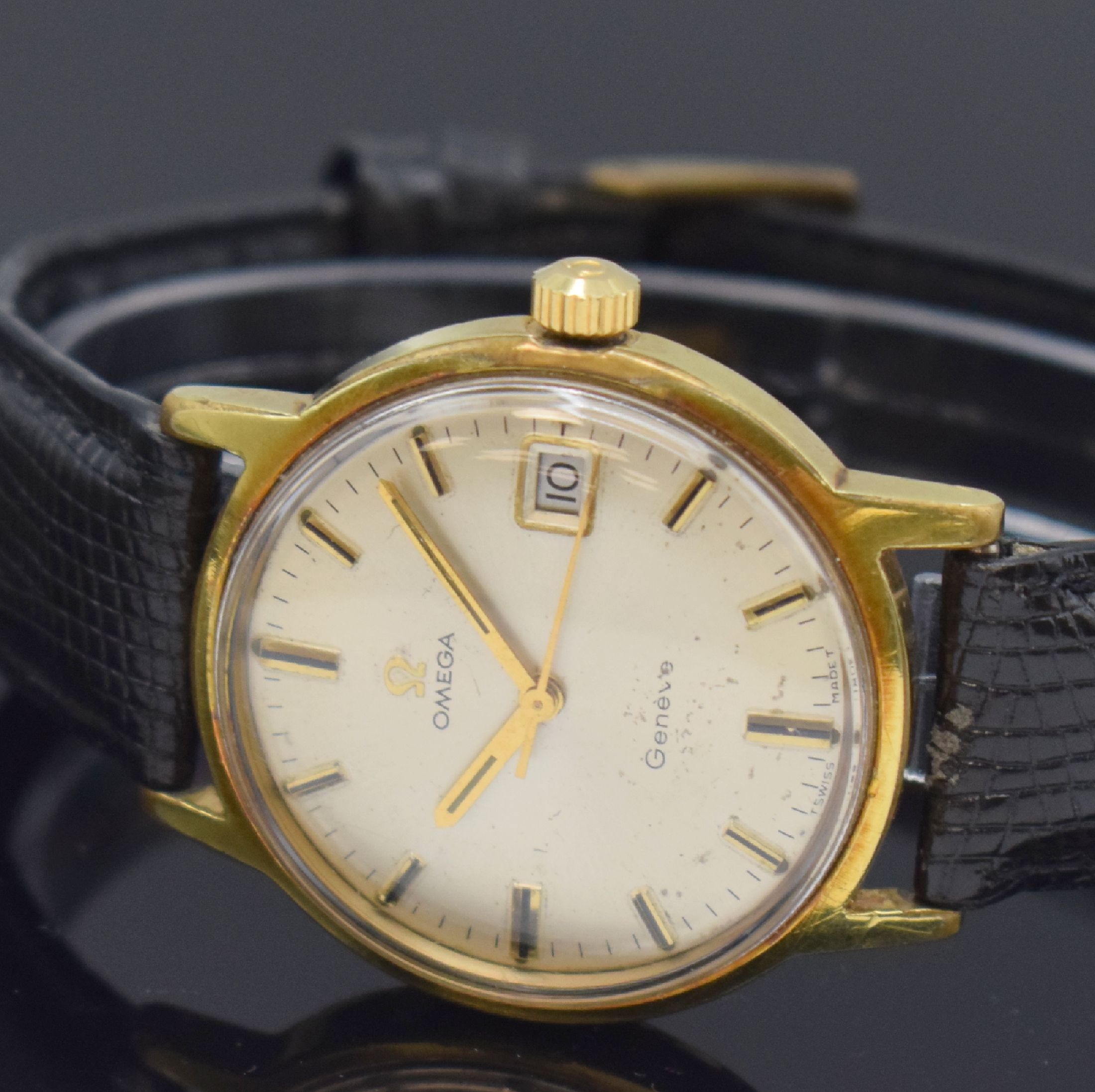 Detail b: OMEGA Geneve vergoldete Armbanduhr Referenz 136.070, Schweiz um 1969, Handaufzug, Boden verschr., silb. Zifferbl. fl., aufgel. Std.- Ind., gold. ...