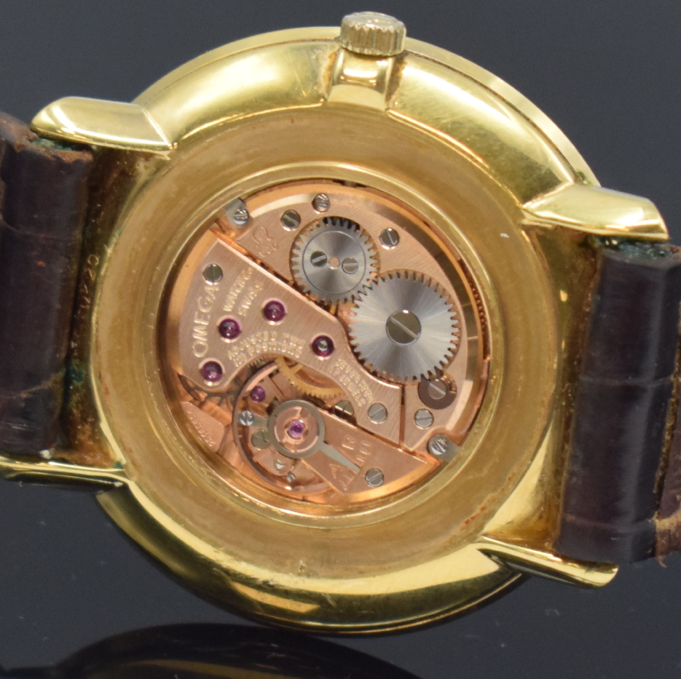 Detail e: OMEGA De Ville vergoldete Armbanduhr Referenz 111.077, Schweiz um 1968, Handaufzug, orig. Lederband (zu ers.) m. verg. Schl., champagnerfarb. ...