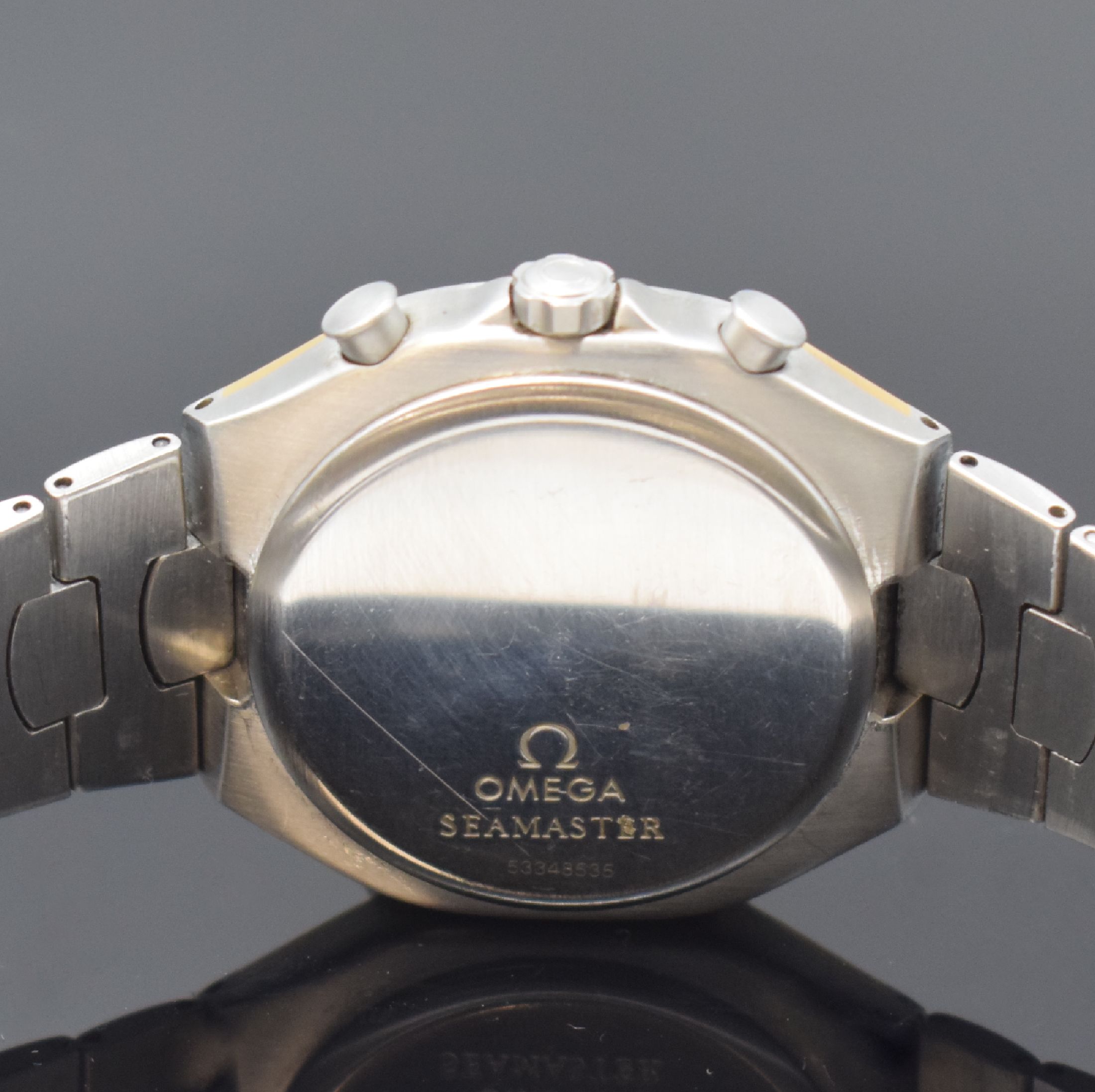Detail d: OMEGA Seamaster Polaris Armbandchronograph Referenz 386.1031, Schweiz um 1990, quarz, goldintarsiertes Edelstahlgeh. inkl. Edelstahlgliederband m. ...