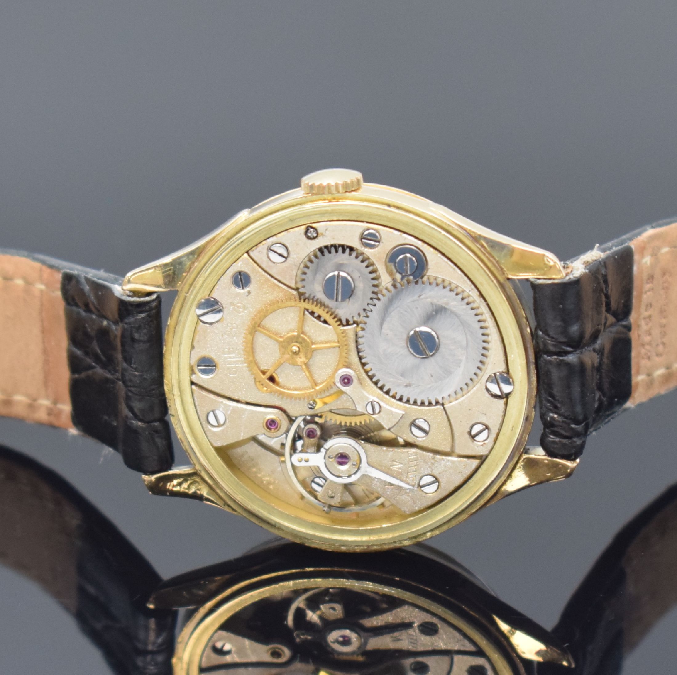 Detail d: GUB Güteuhr mit Lange-Werk Kal. 28/1 sehr seltene Armbanduhr in Gold 585/000, DDR lt. Stammbuchauszug verk. 1953, Handaufzug, 3-tlg. Geh., Boden u. ...