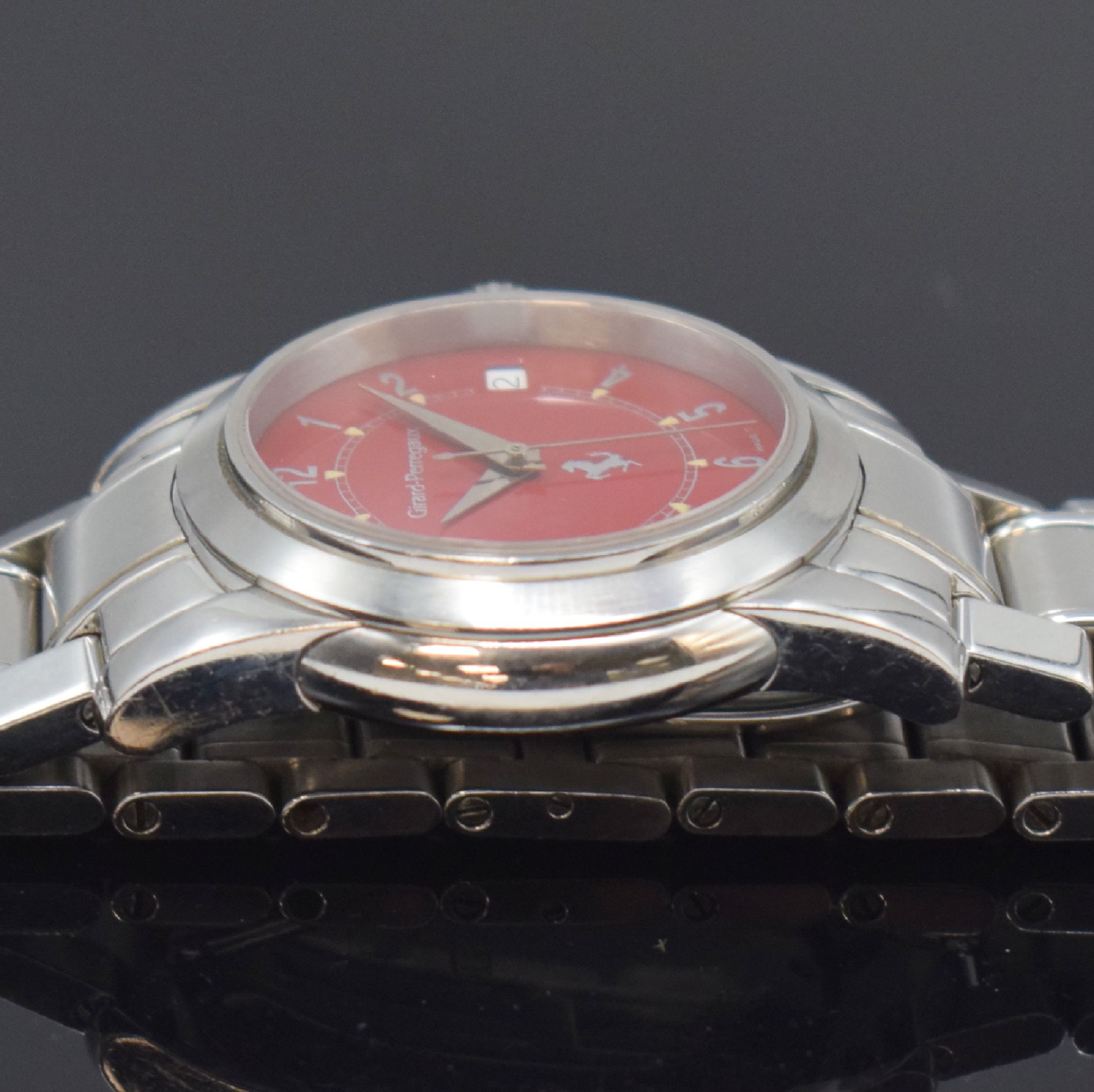 Detail c: GIRARD PERREGAUX für FERRARI Armbanduhr in Stahl/Stahlband Referenz 8025, Schweiz um 2000, Automatik, 6-fach verschr. Geh., rotes Zifferbl. m. ...