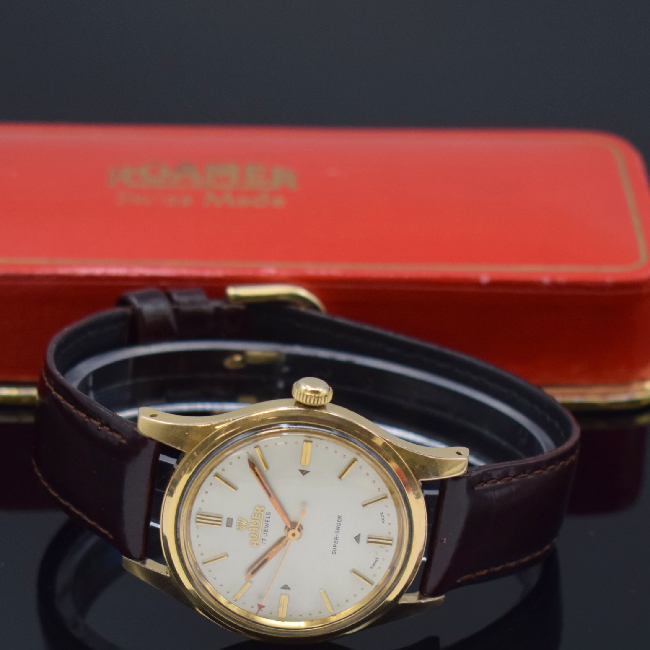 Detail a: ROAMER Herrenarmbanduhr mit original Etui und Verkaufsprospekt, Schweiz um 1960, Patent- Nr. 305 467/305 776, Handaufzug, Monocoque- Geh., Oberteil ...