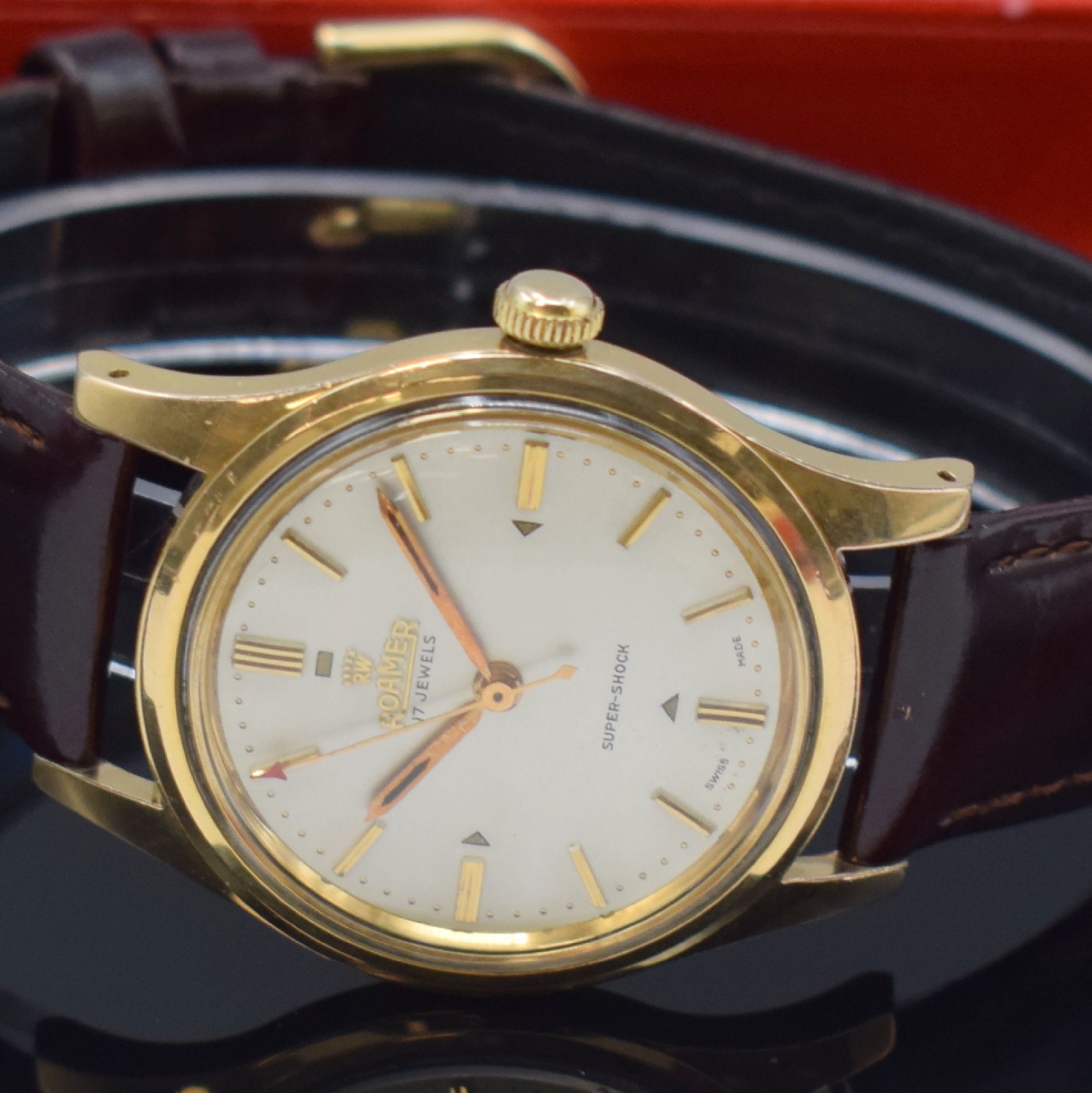 Detail b: ROAMER Herrenarmbanduhr mit original Etui und Verkaufsprospekt, Schweiz um 1960, Patent- Nr. 305 467/305 776, Handaufzug, Monocoque- Geh., Oberteil ...